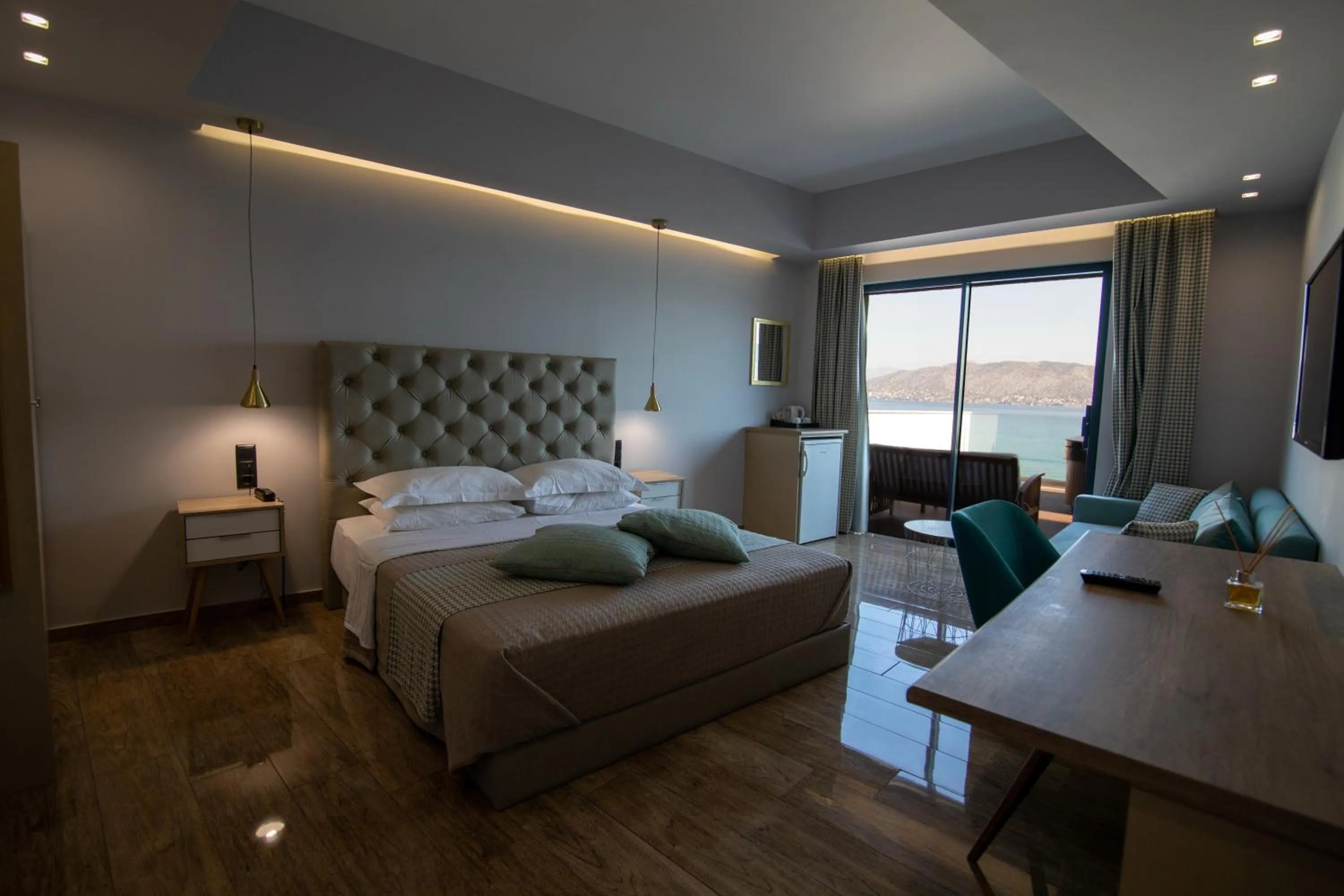 Photo of the whole room, Bed in Aianteion Bay Luxury Hotel & Suites