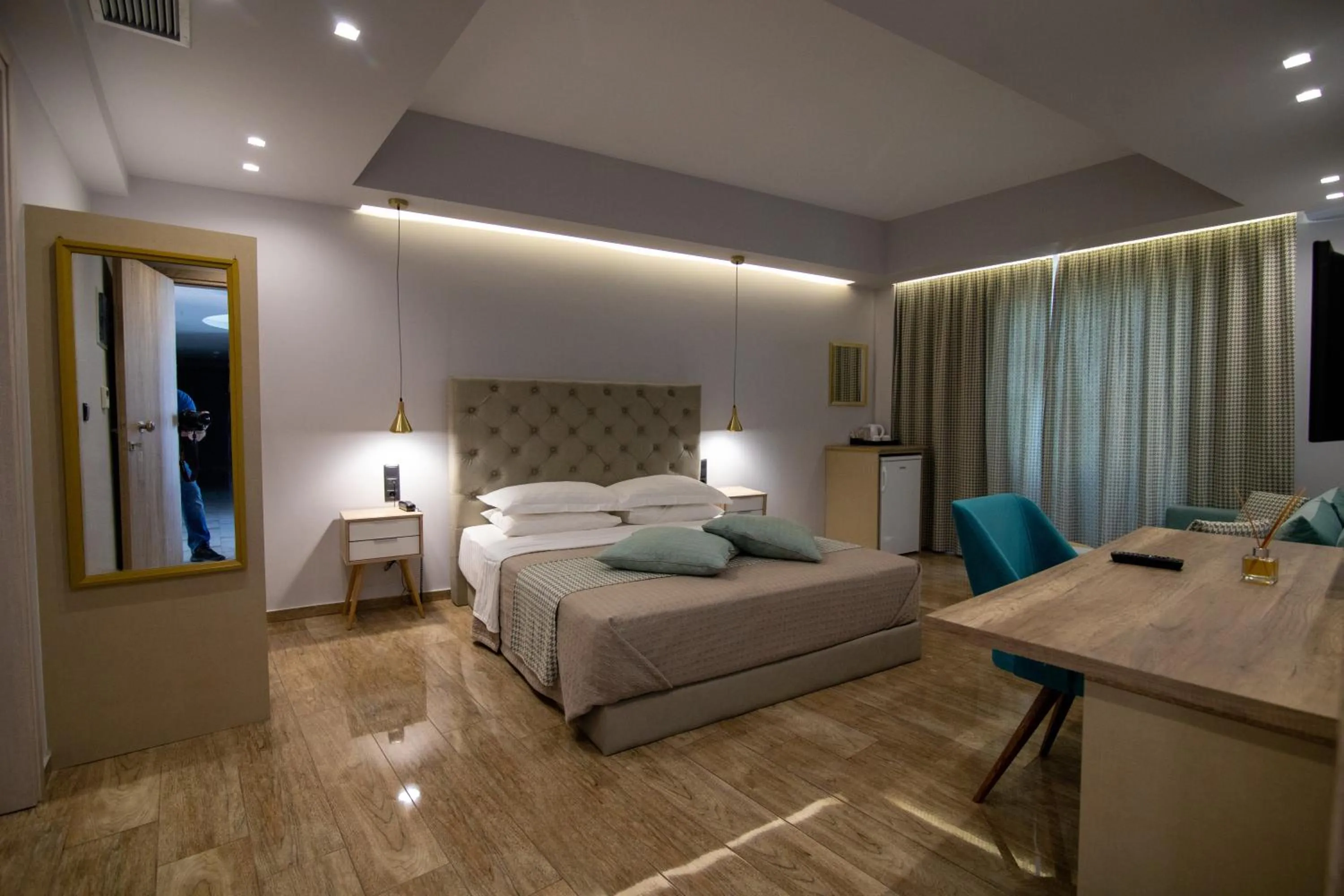 Bed in Aianteion Bay Luxury Hotel & Suites