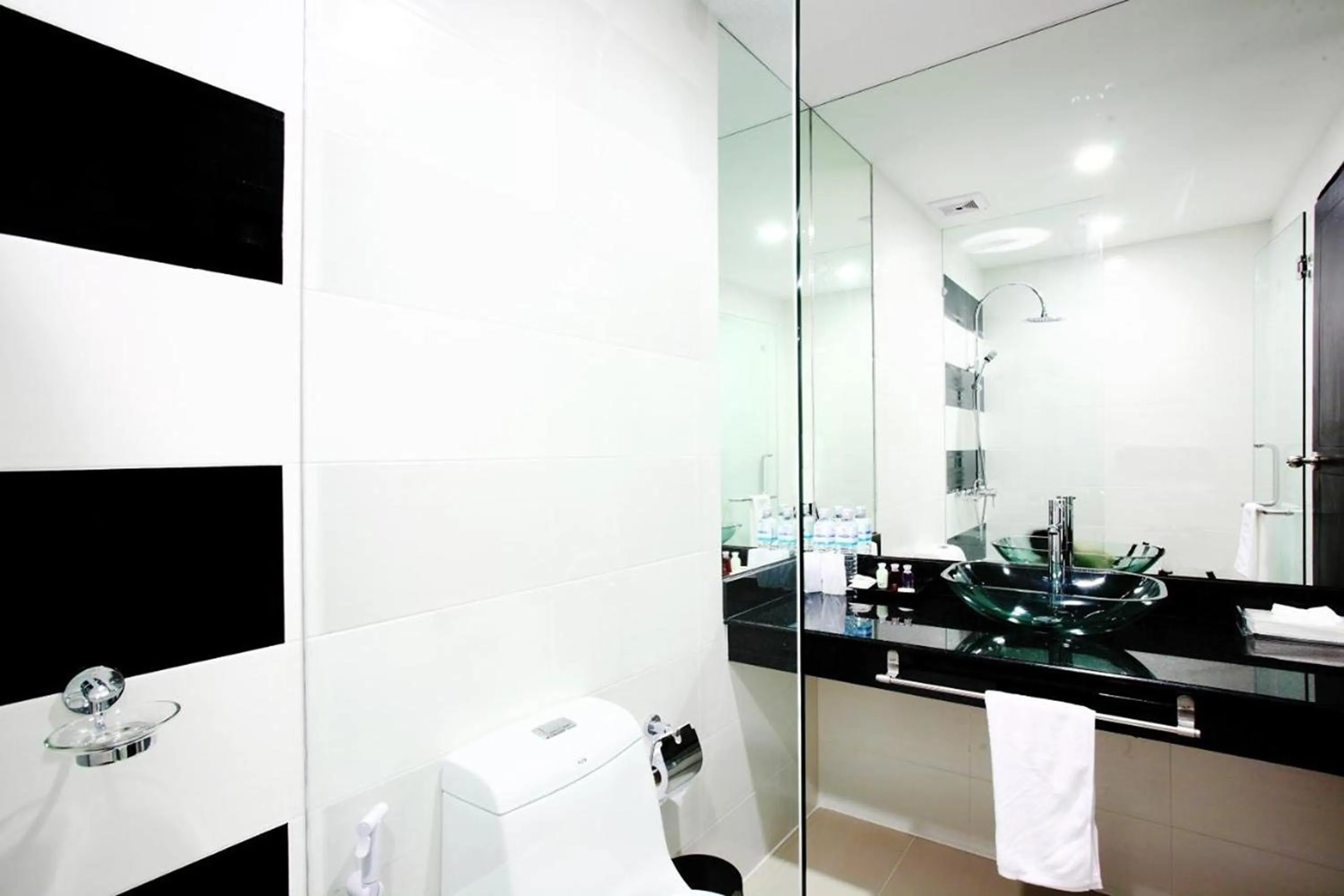 Bathroom in One World One Home Naiharn Hotel