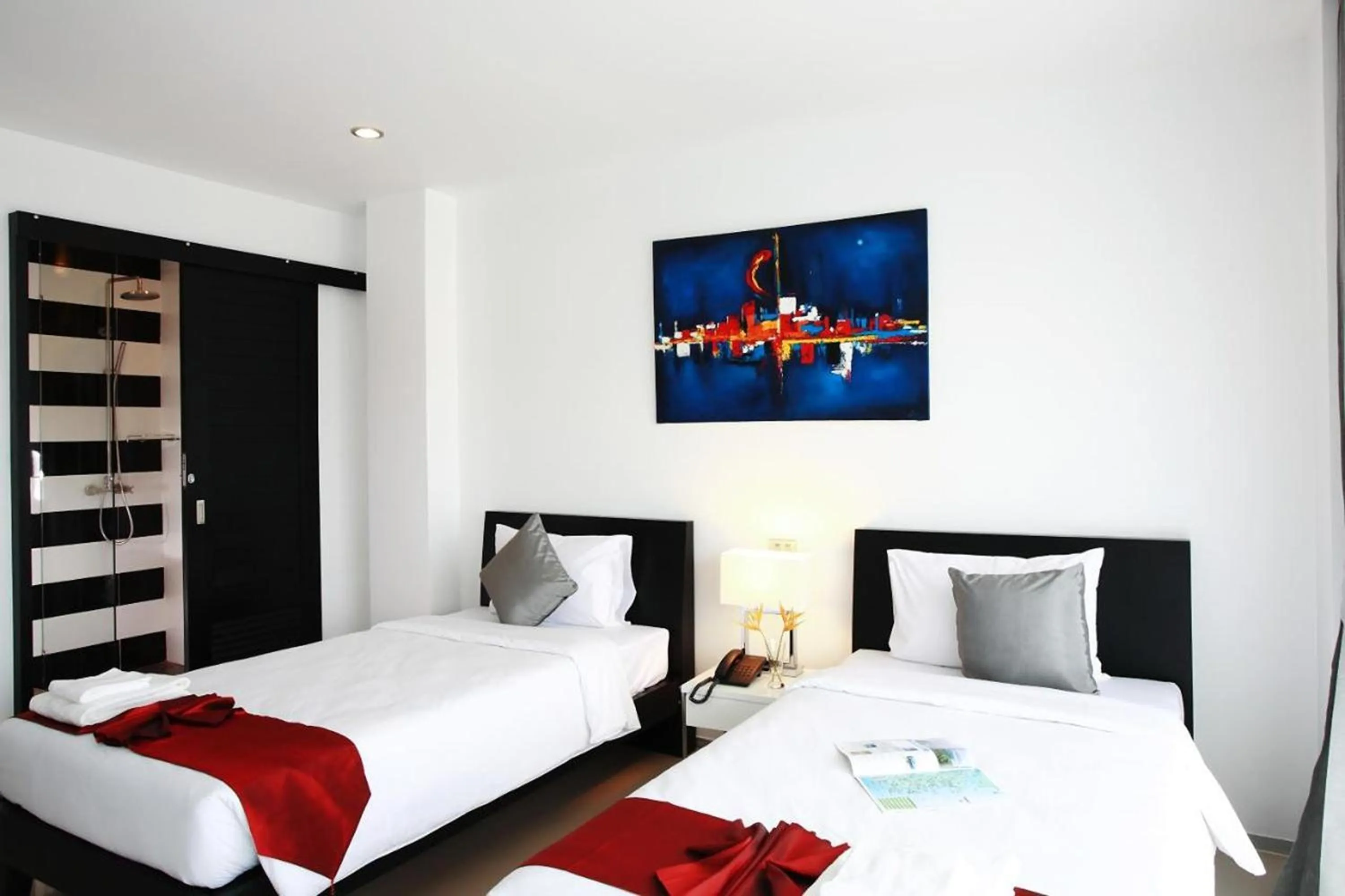 Bed in One World One Home Naiharn Hotel