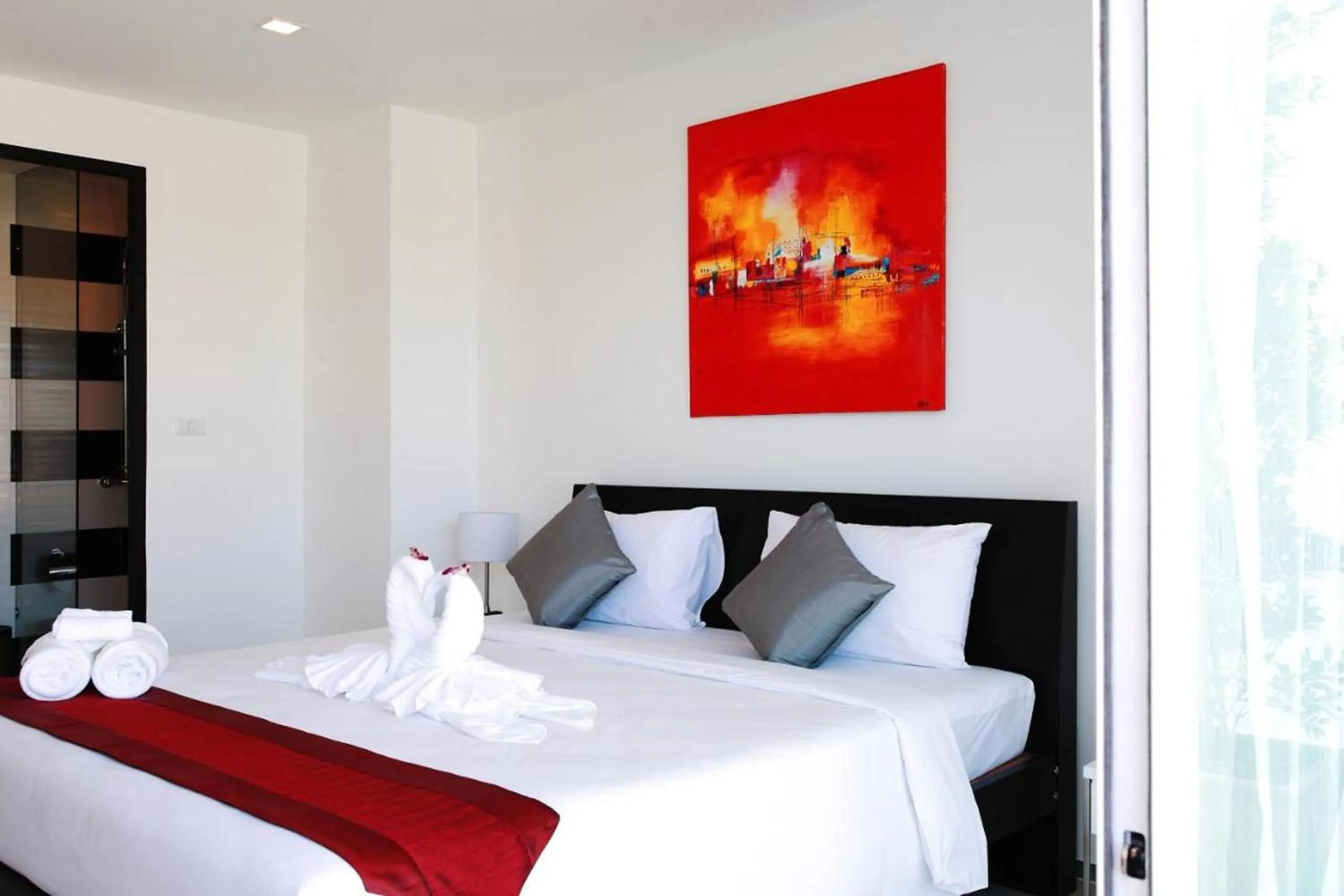 Bed in One World One Home Naiharn Hotel