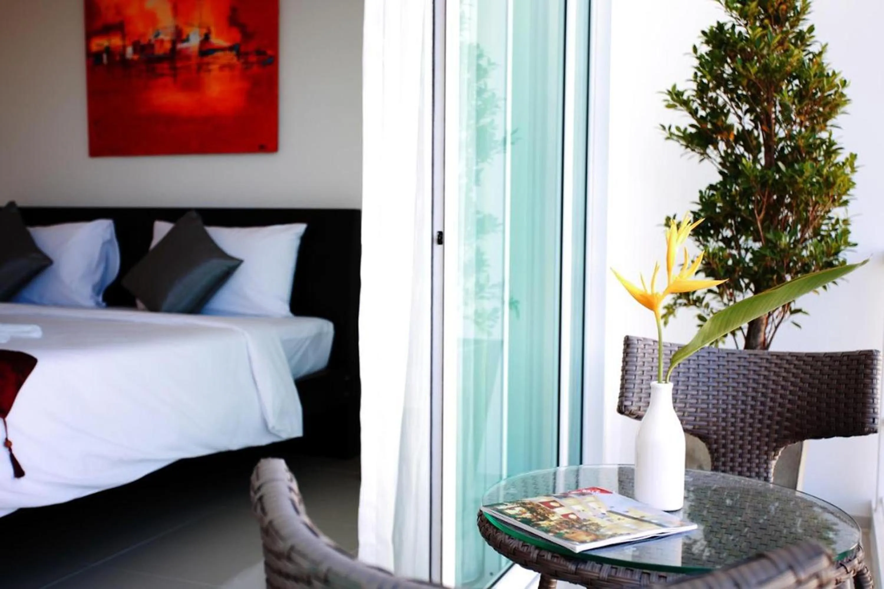 Bed in One World One Home Naiharn Hotel