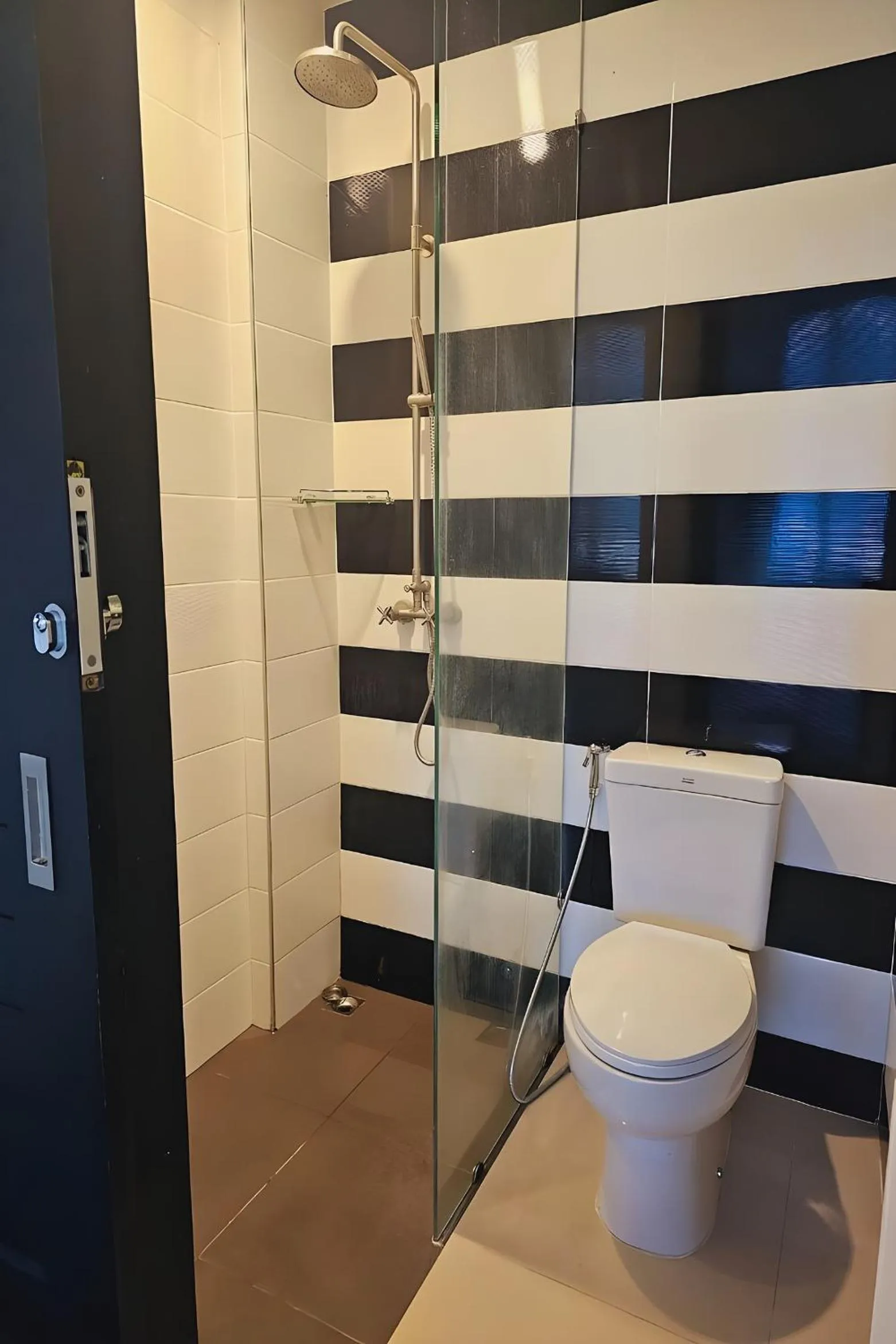 Bathroom in One World One Home Naiharn Hotel