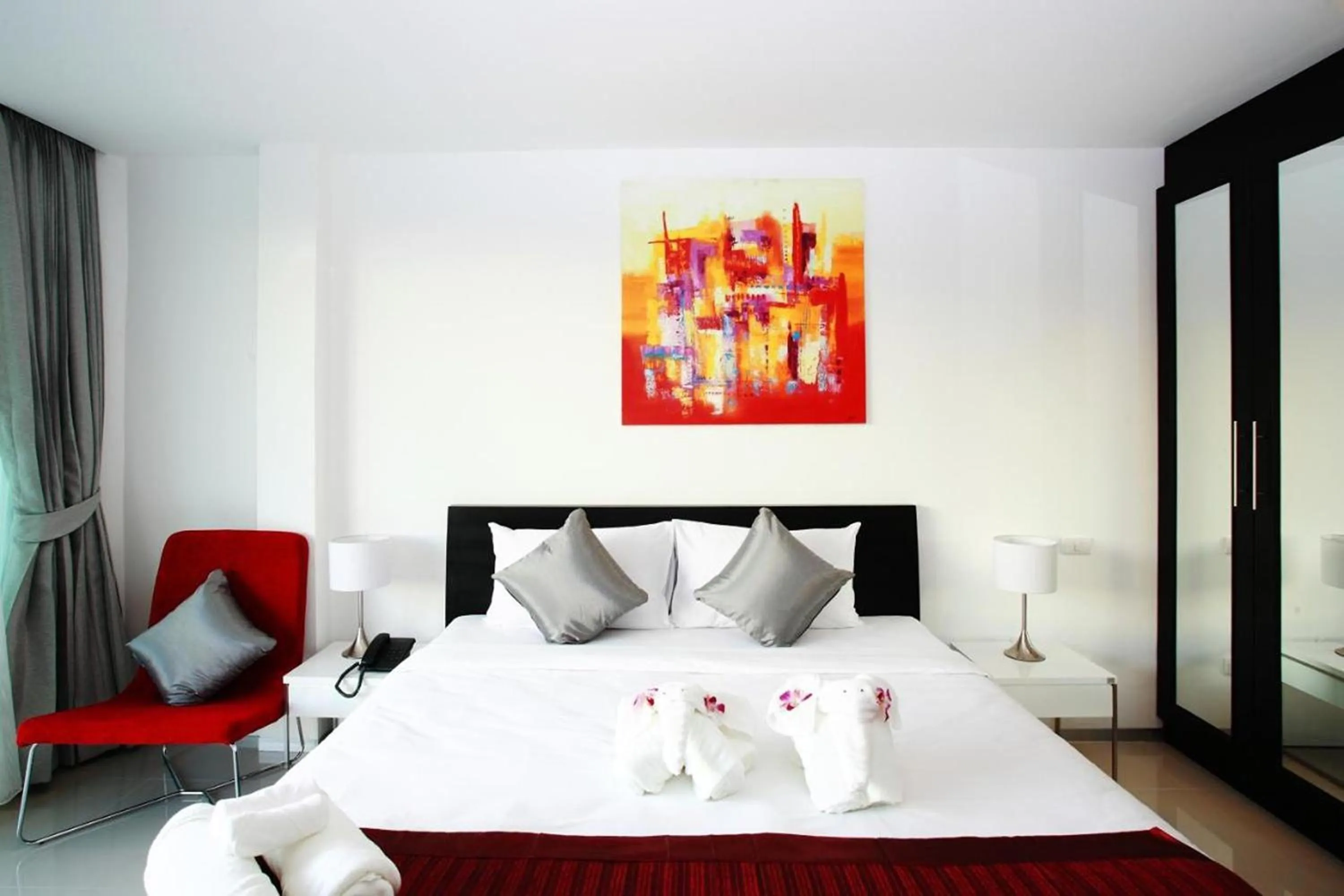 Bed in One World One Home Naiharn Hotel