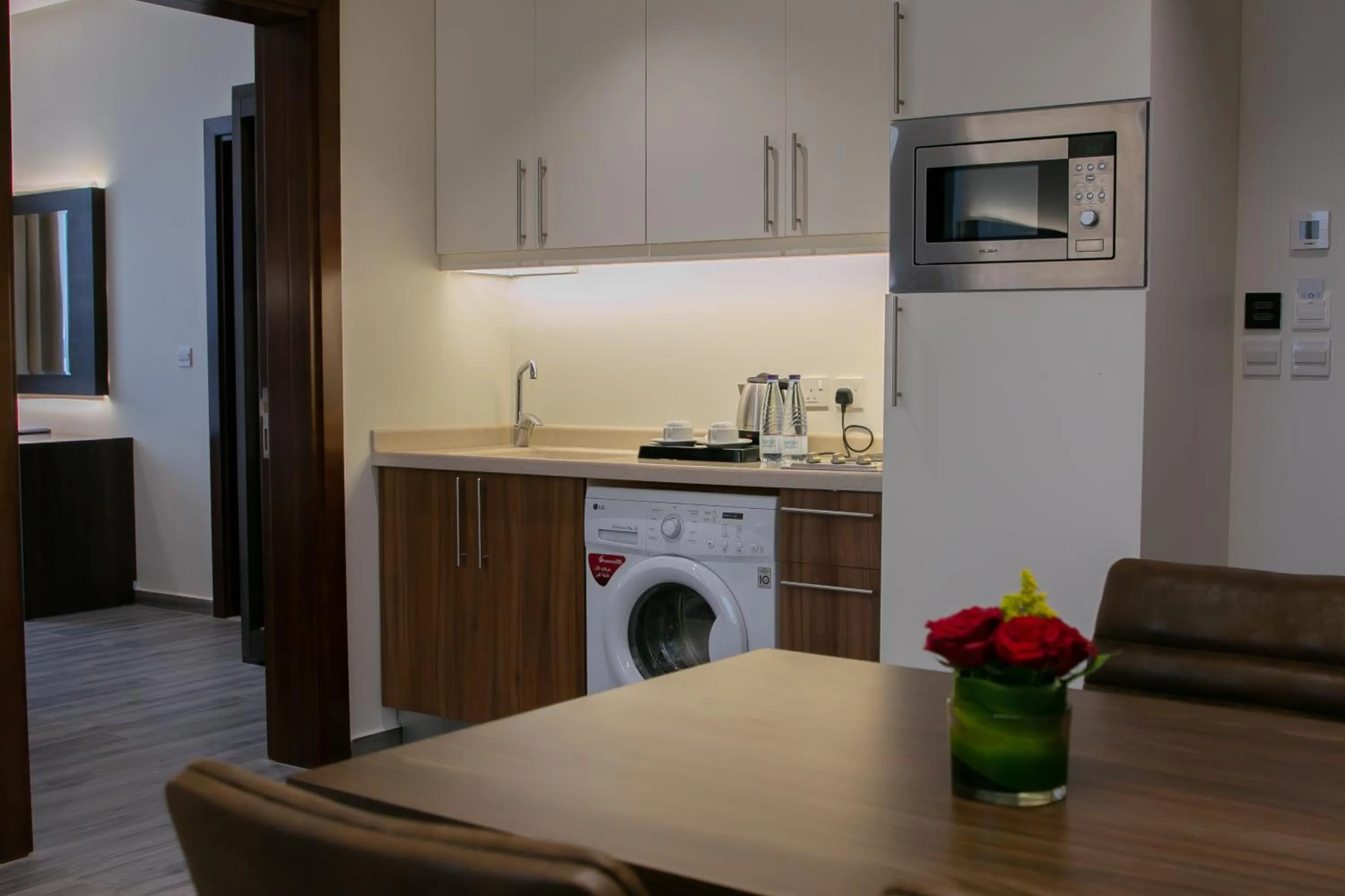 Kitchen or kitchenette in Hafawah Suites