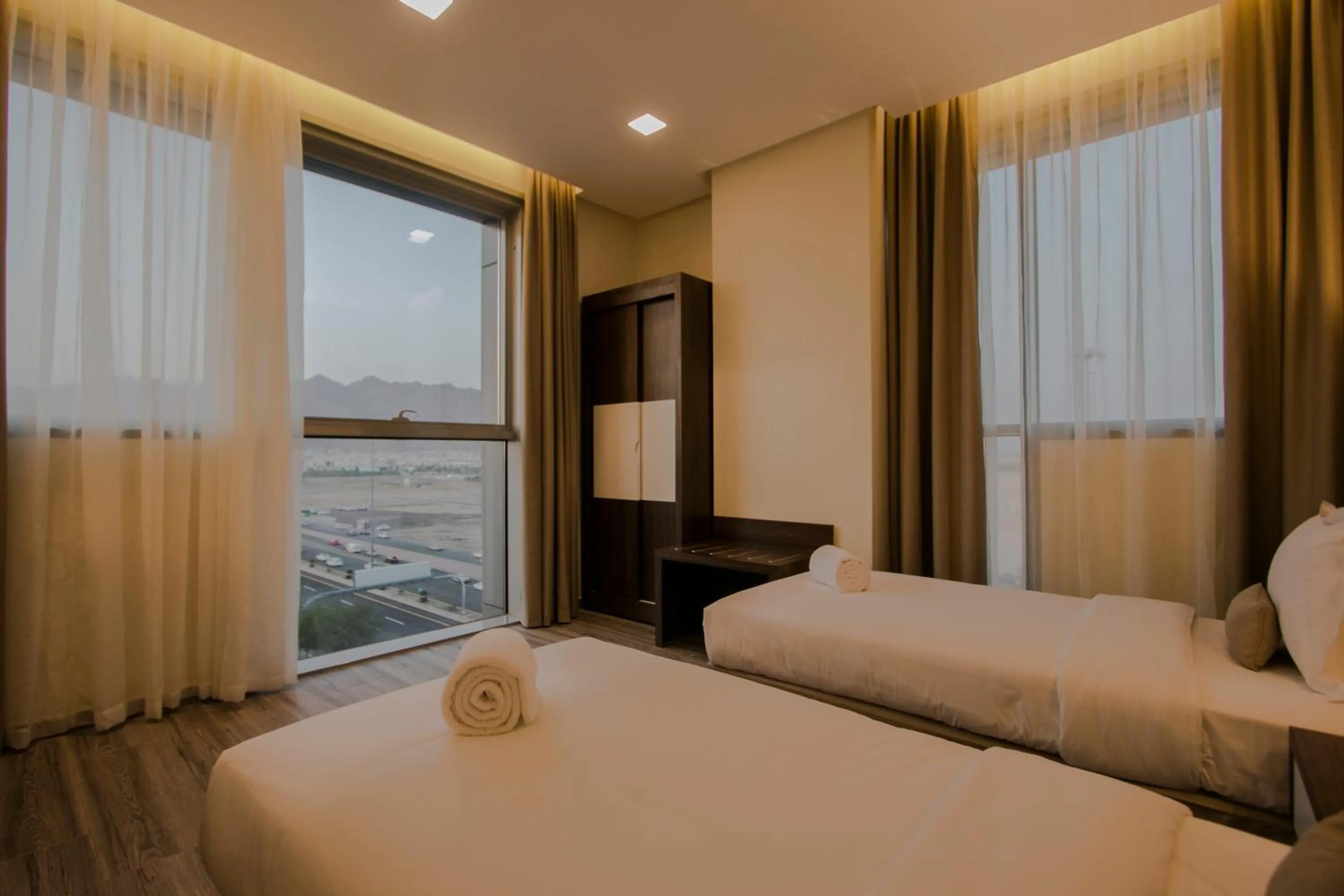 Bed in Hafawah Suites