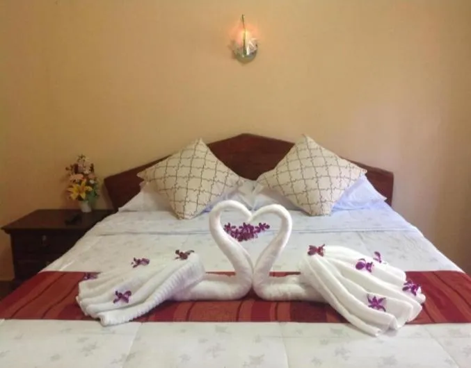 Bed in Ruan Mai Naiyang Beach Resort