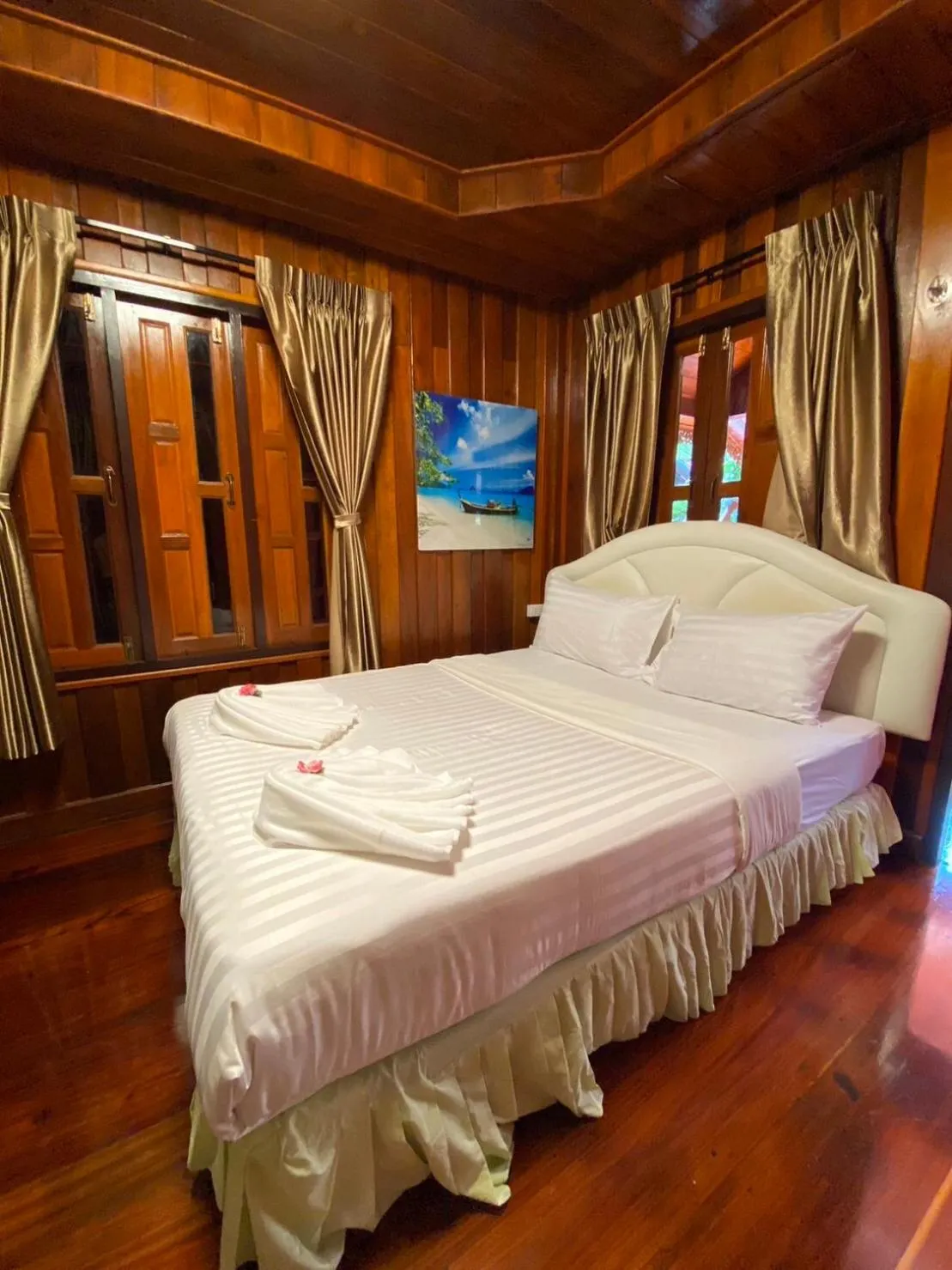 Bed in Ruan Mai Naiyang Beach Resort