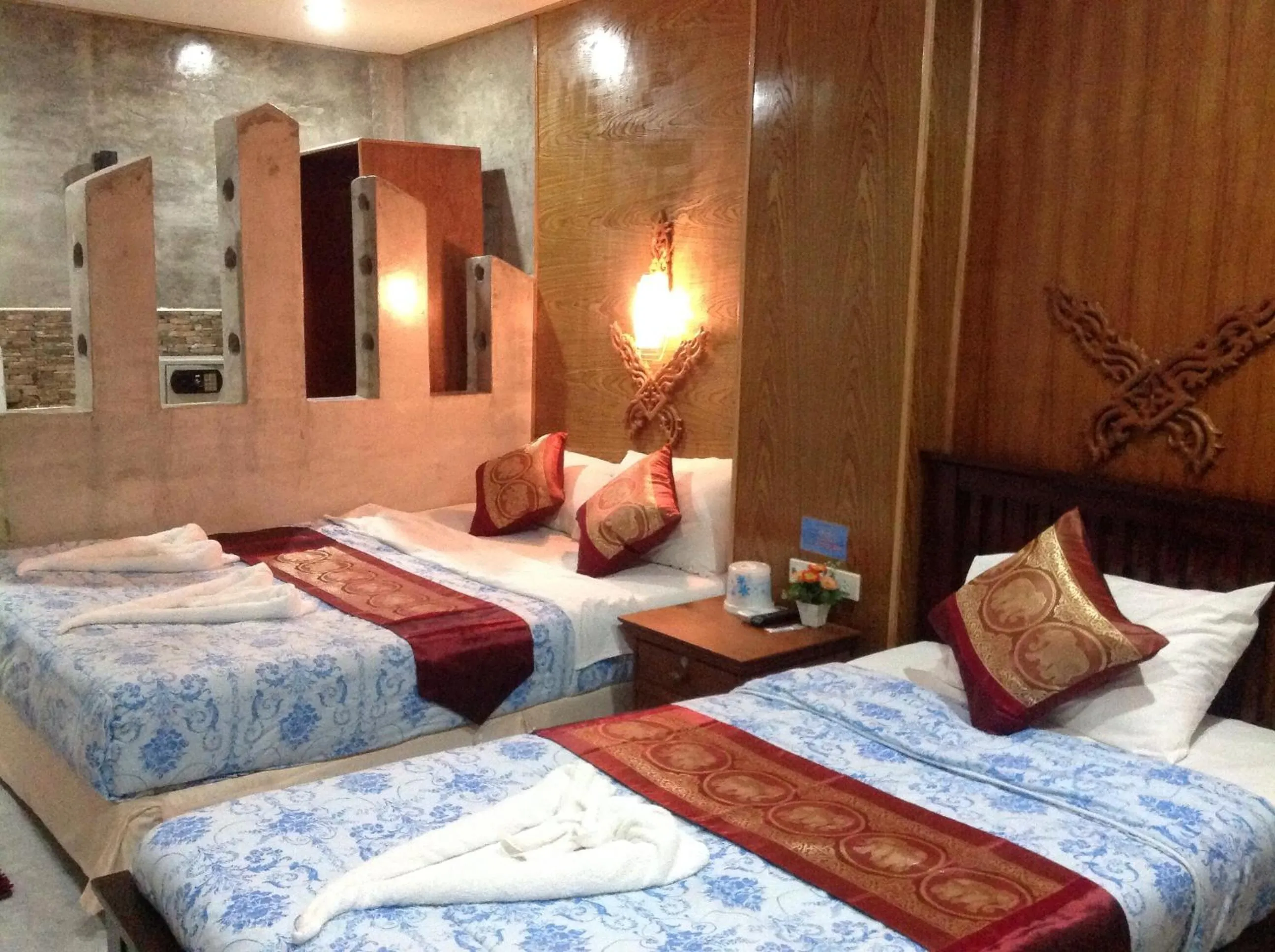 Photo of the whole room, Bed in Ruan Mai Naiyang Beach Resort