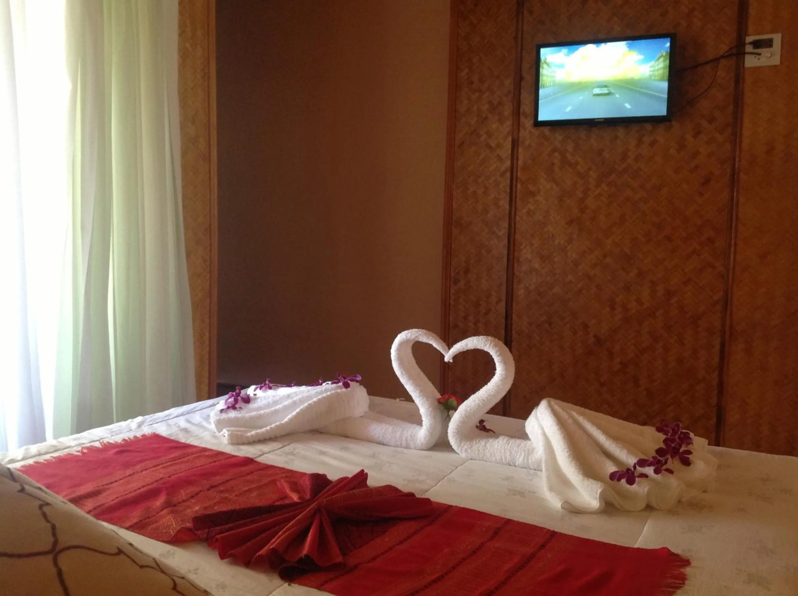 Bed in Ruan Mai Naiyang Beach Resort