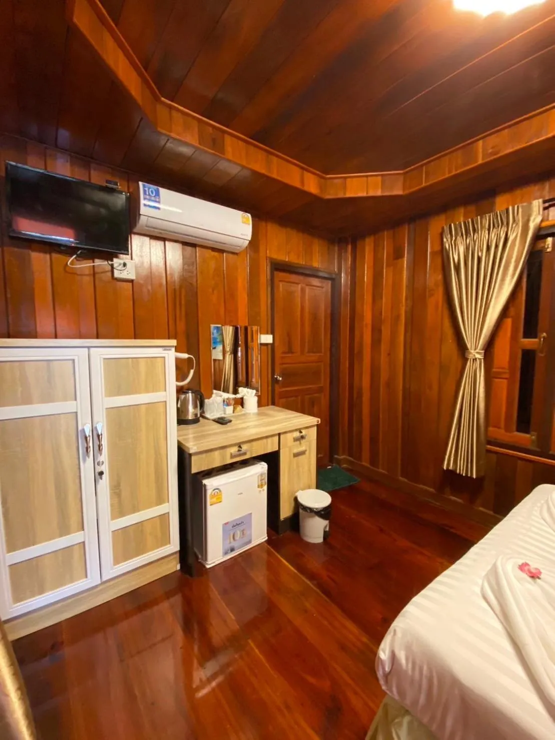 Bed in Ruan Mai Naiyang Beach Resort