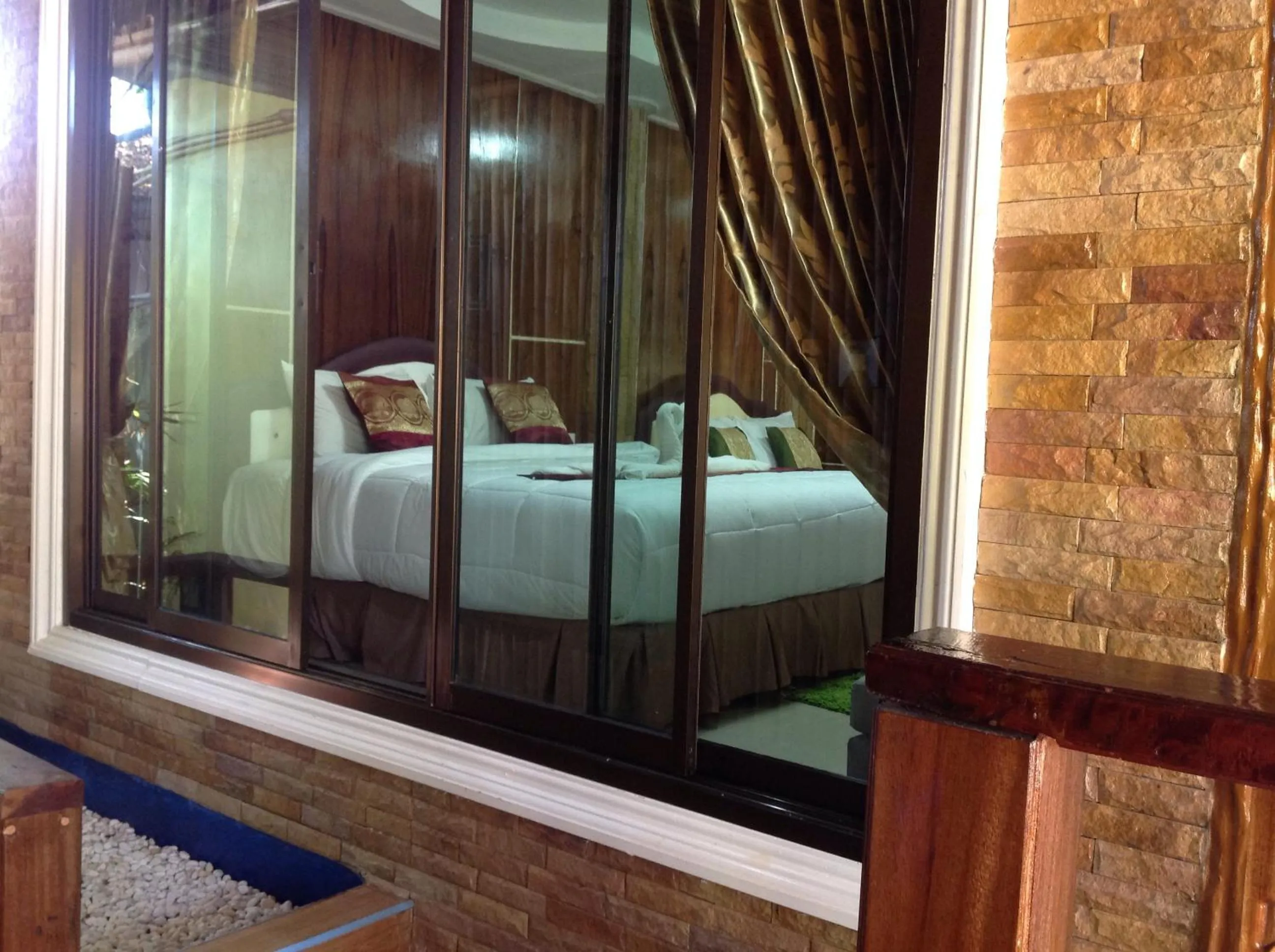 Bed in Ruan Mai Naiyang Beach Resort