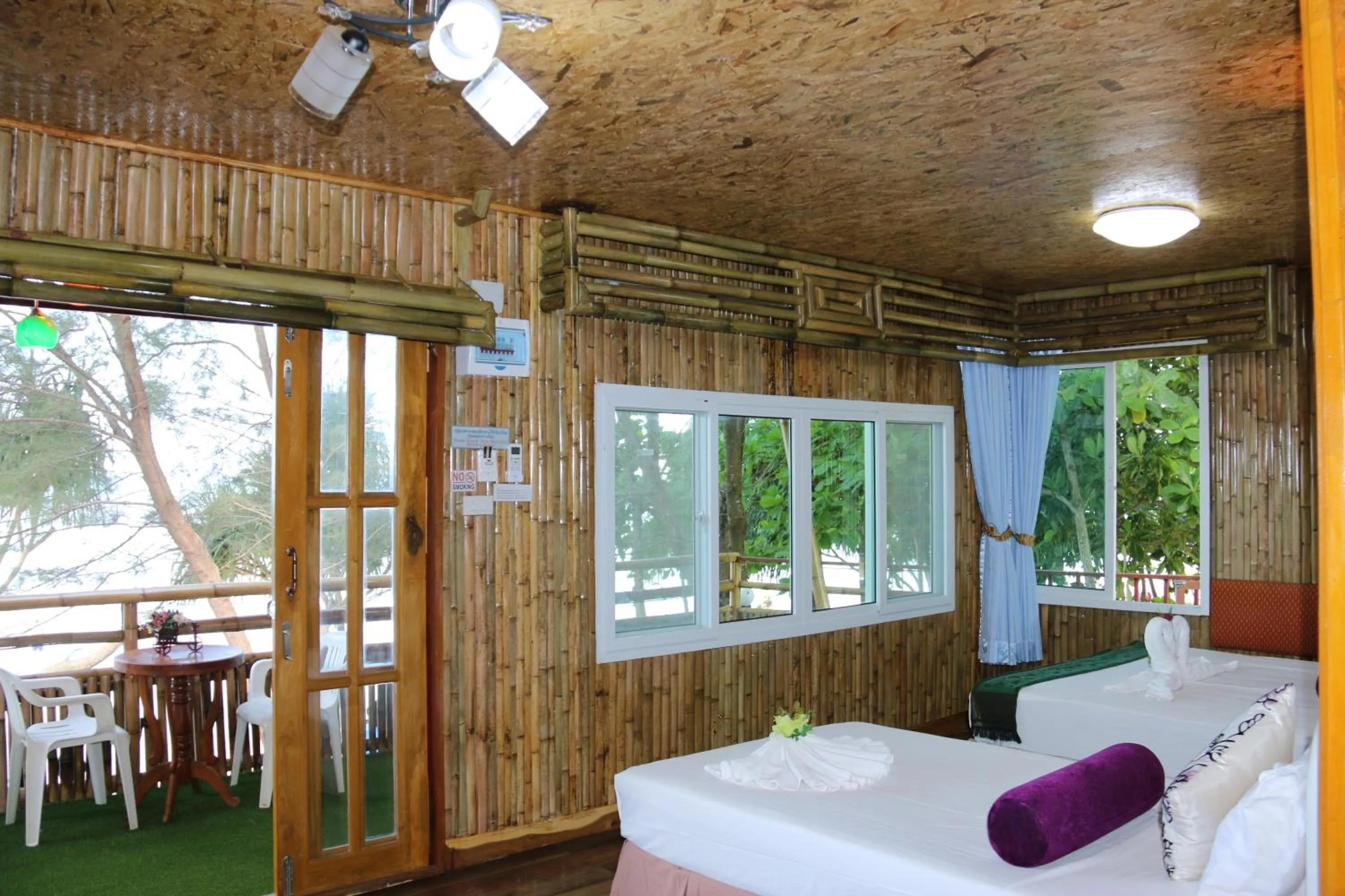 Bed in Ruan Mai Naiyang Beach Resort