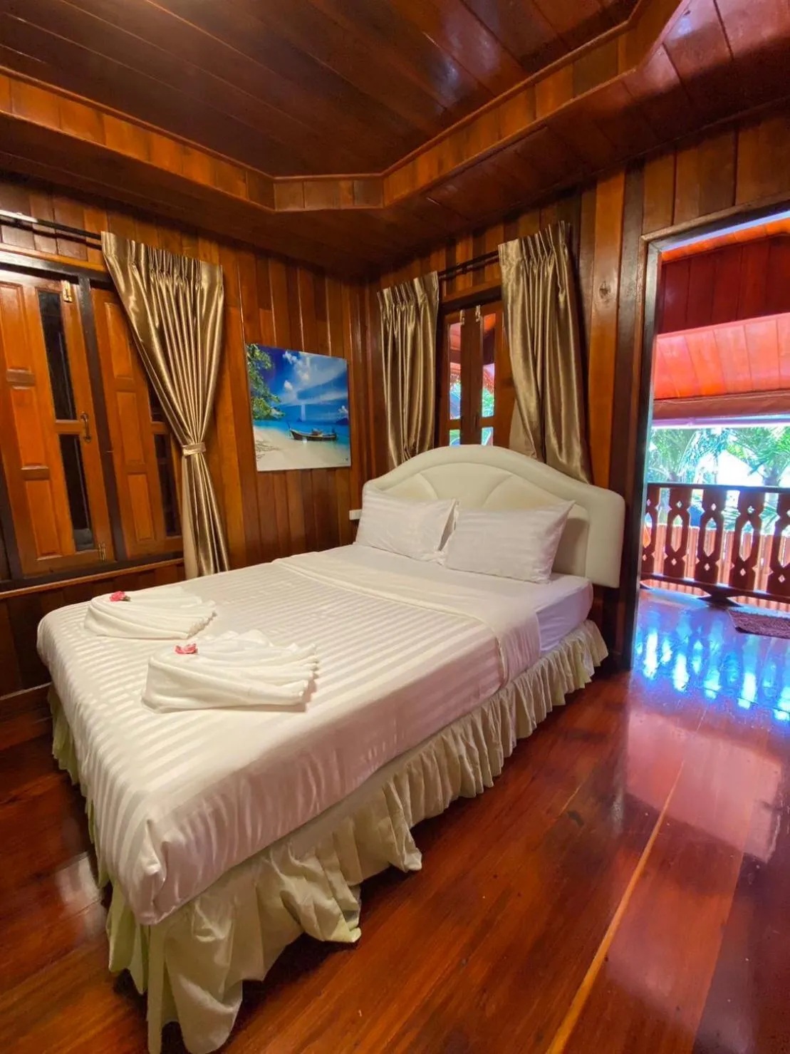 Bed in Ruan Mai Naiyang Beach Resort
