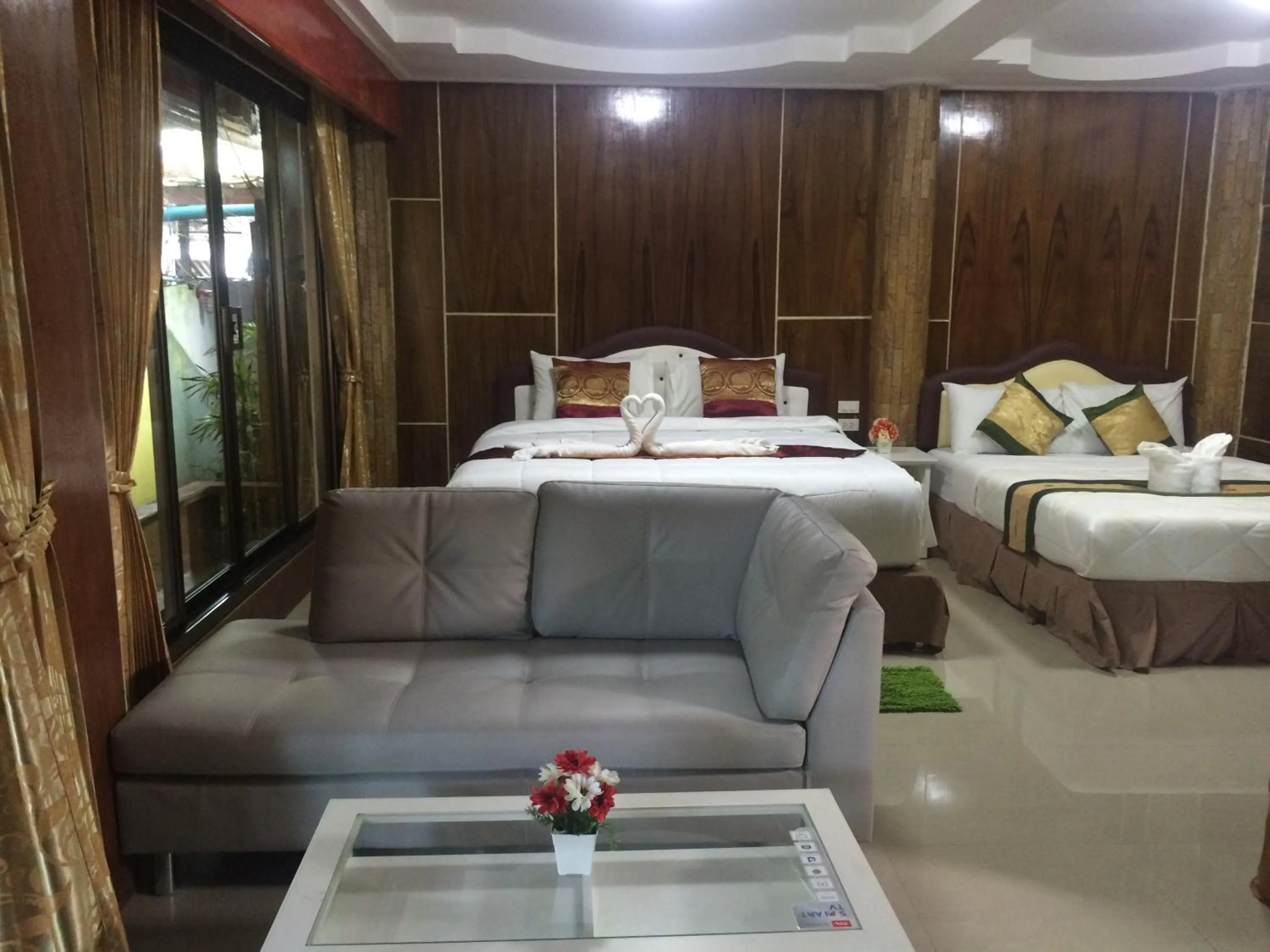 Bed in Ruan Mai Naiyang Beach Resort