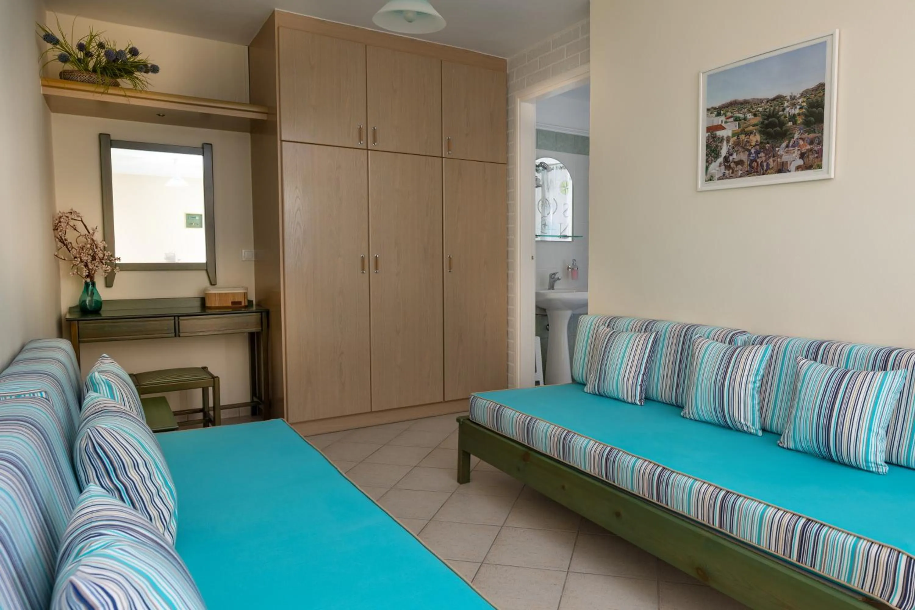 Bed in Armonia Apartments