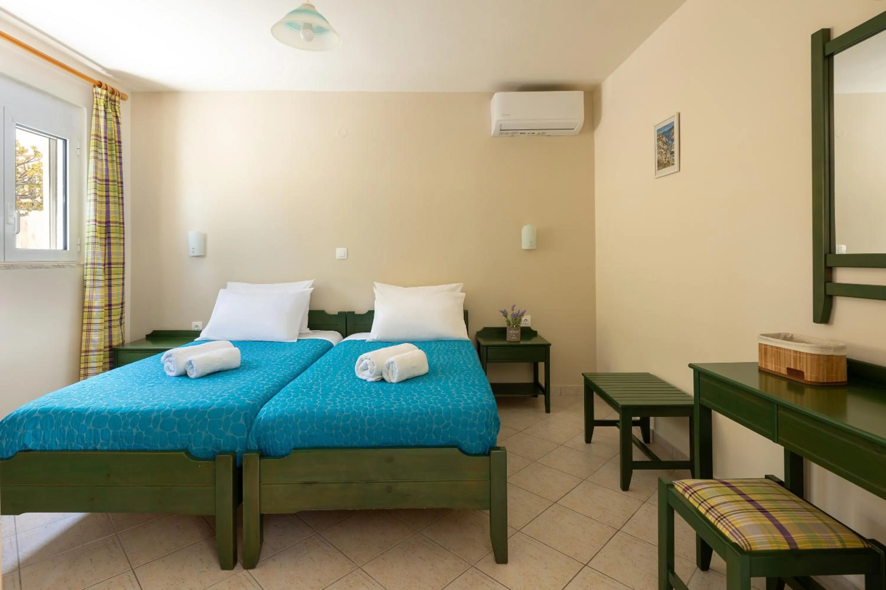 Bed in Armonia Apartments