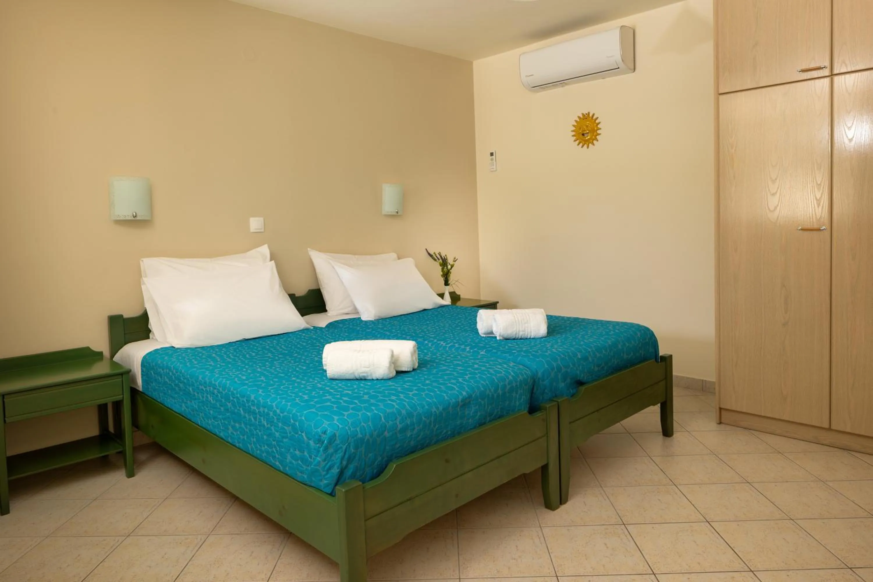 Bed in Armonia Apartments