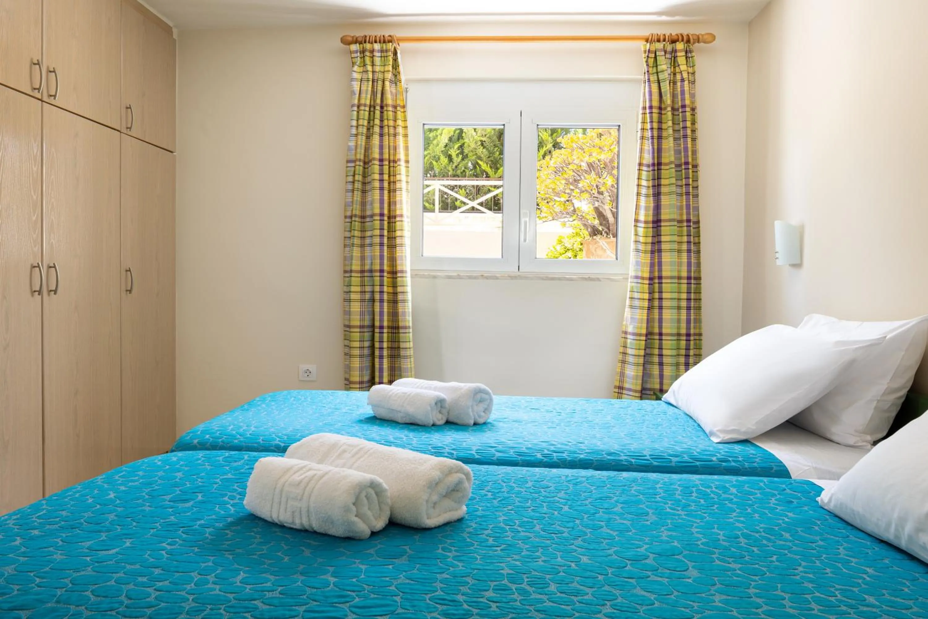 Bed in Armonia Apartments