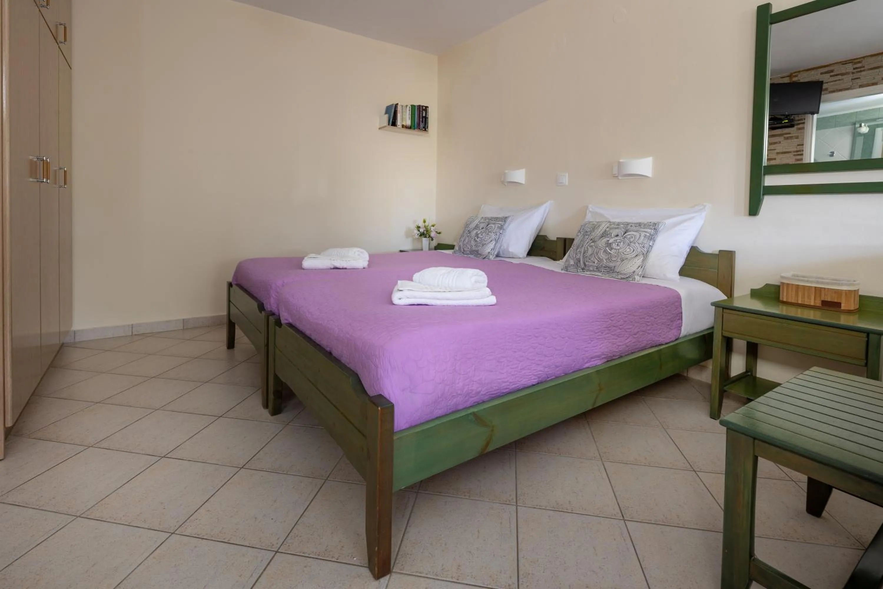 Bed in Armonia Apartments