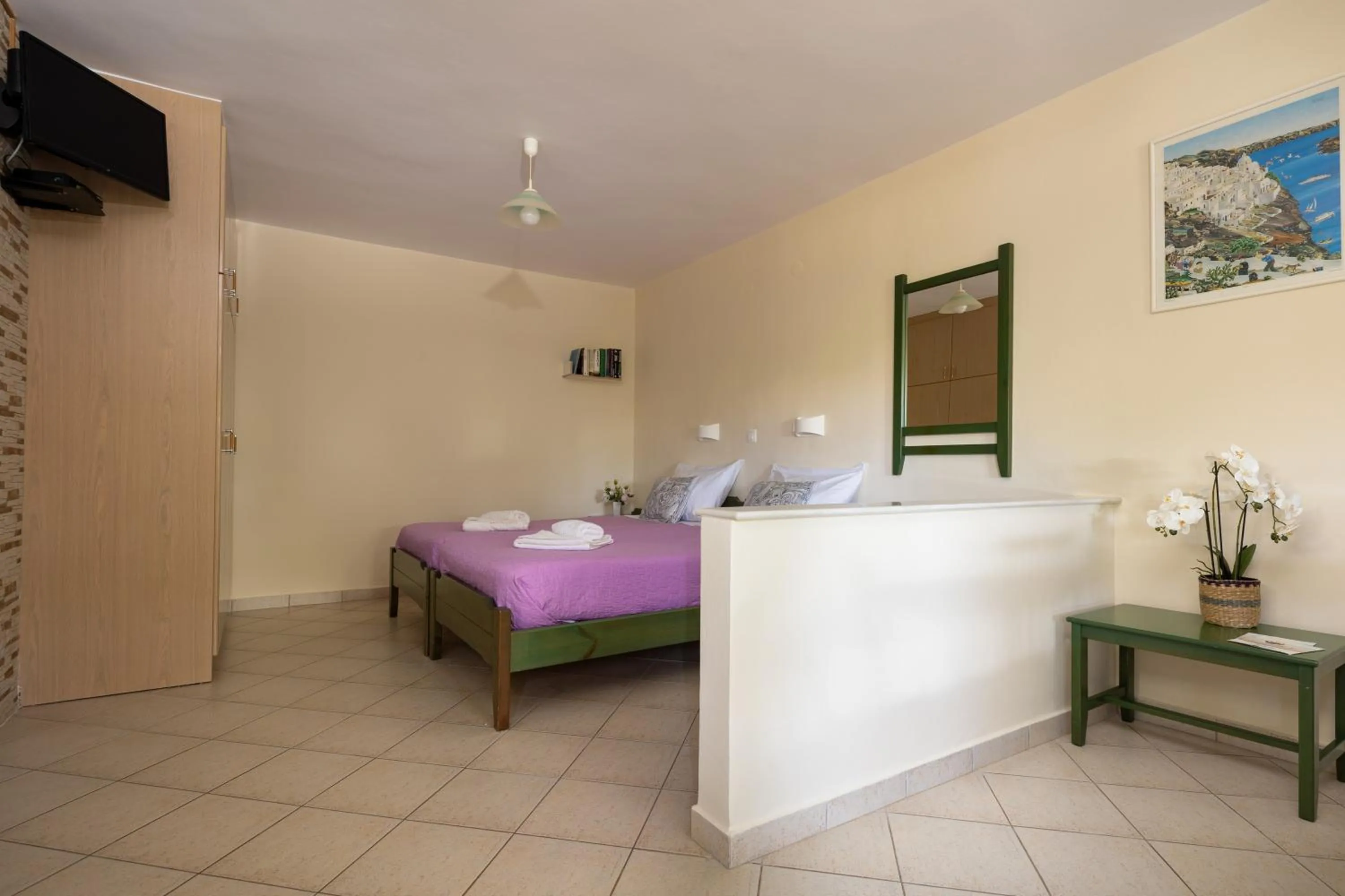 Bed in Armonia Apartments