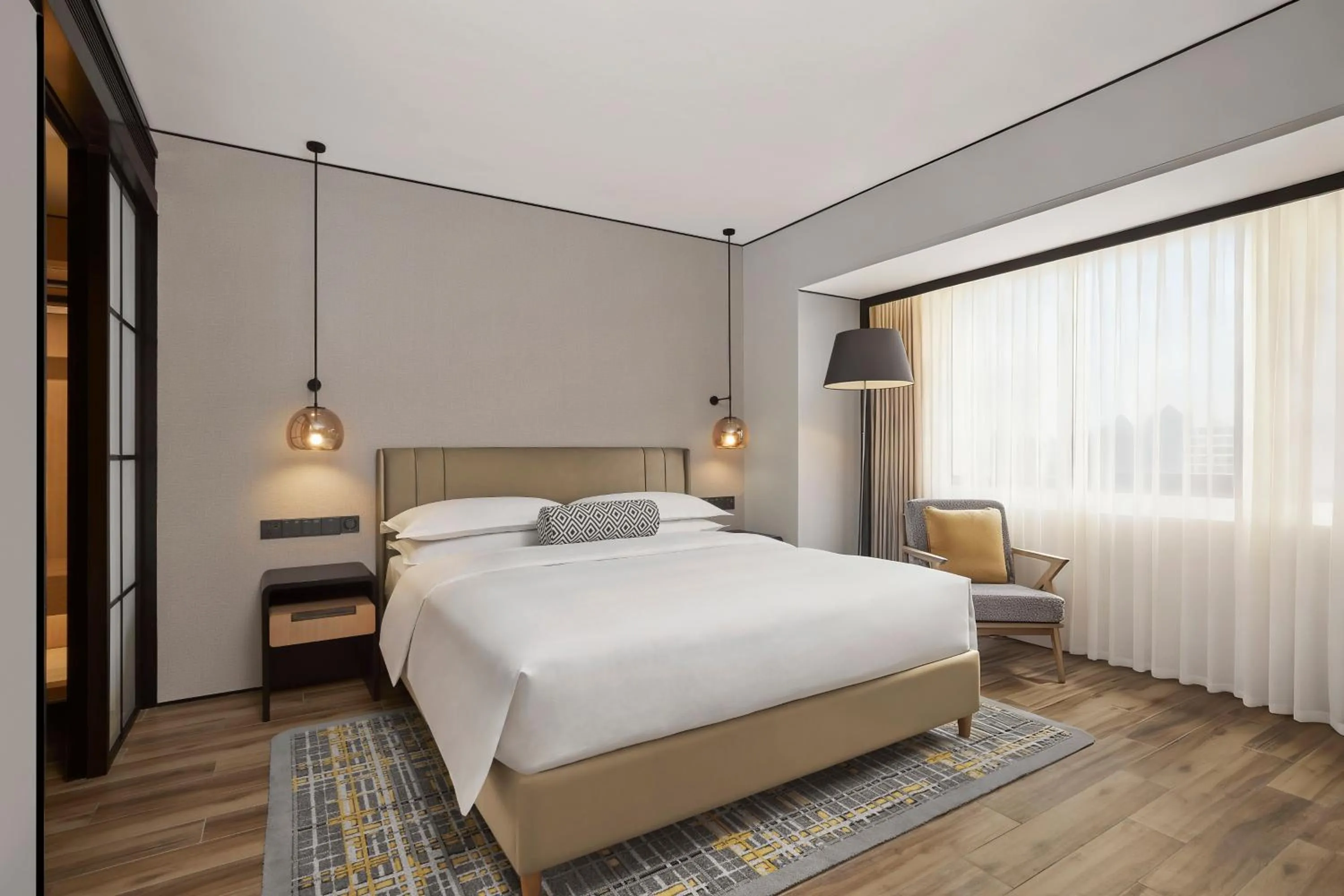 Bed in Sheraton Chengdu Lido Hotel