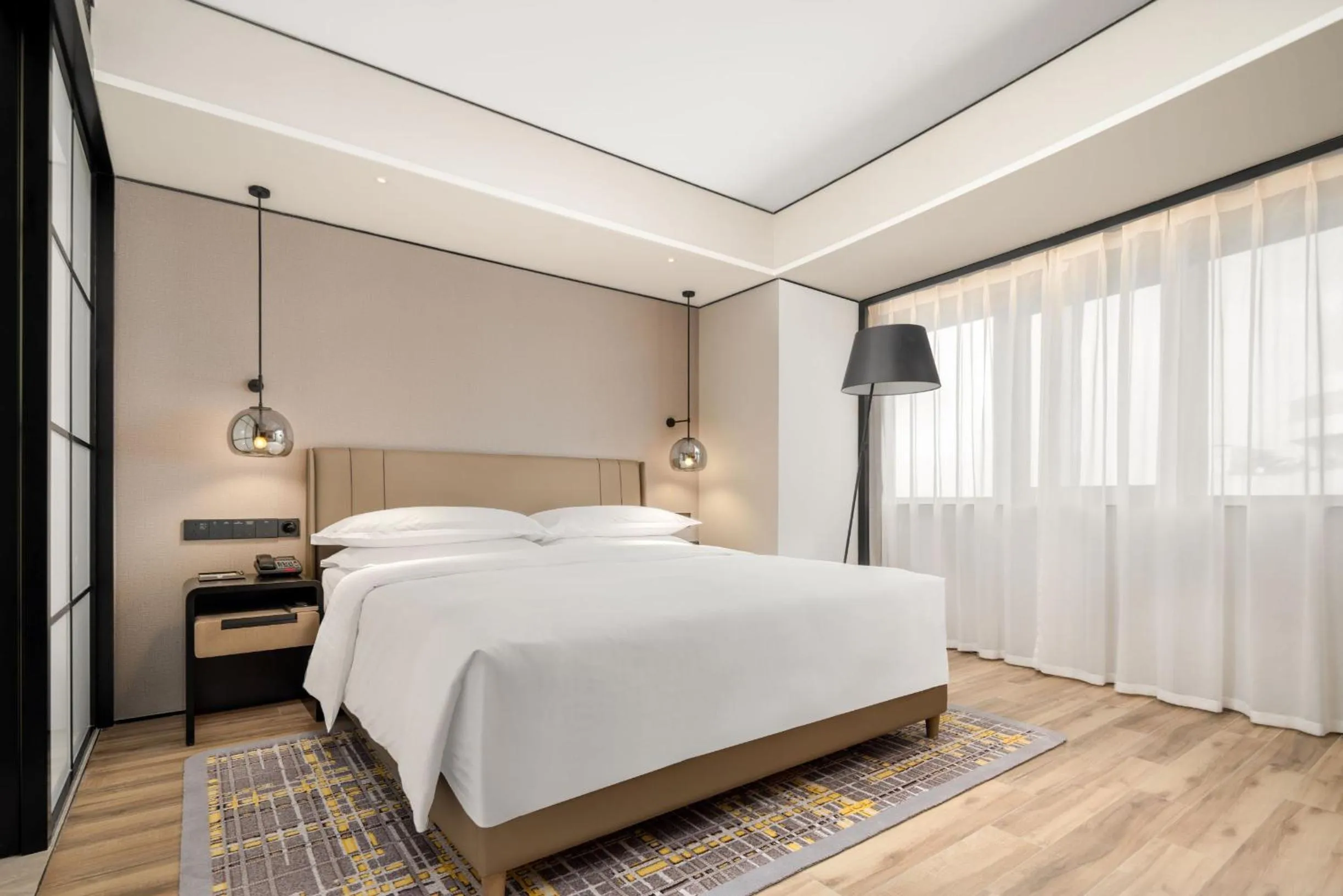 Bed in Sheraton Chengdu Lido Hotel