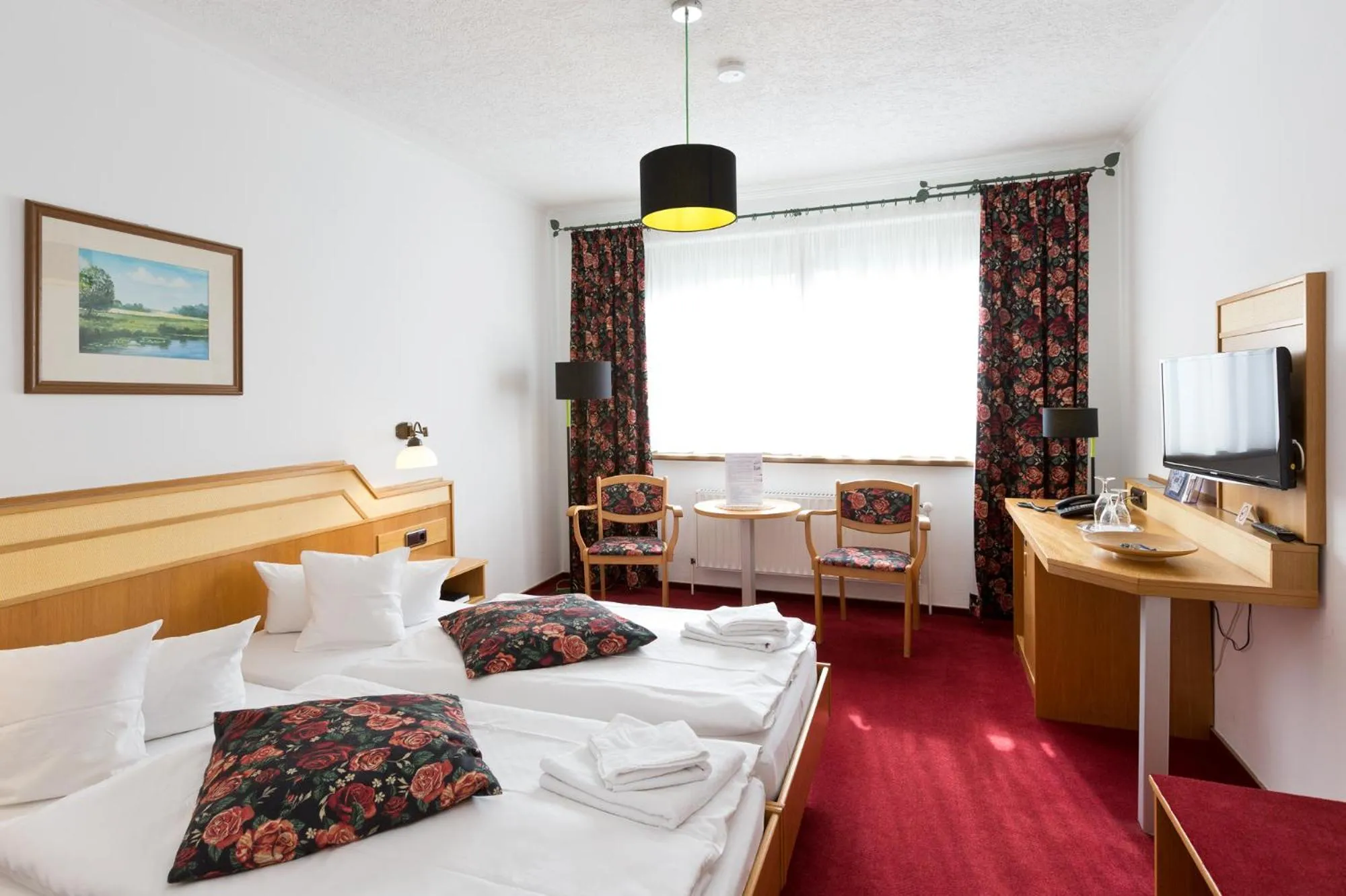 Photo of the whole room, Bed in Landhotel Zur Schmiede