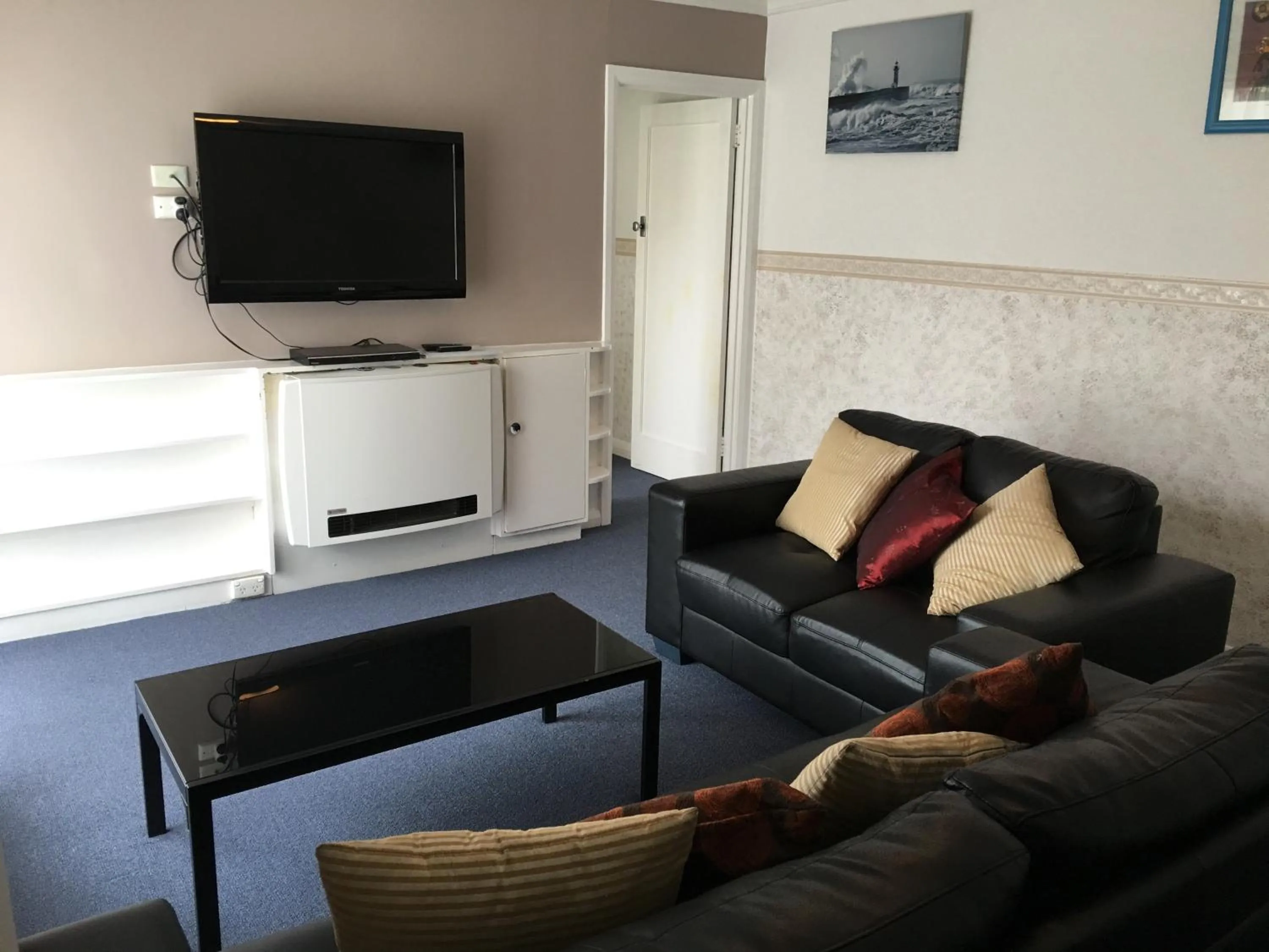 Living room, TV/Entertainment Center in Hobart Apartments