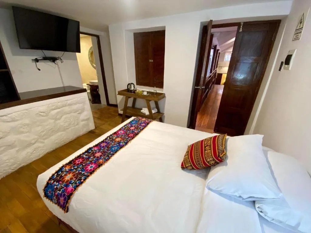 Bed in Cusco Hotel Boutique