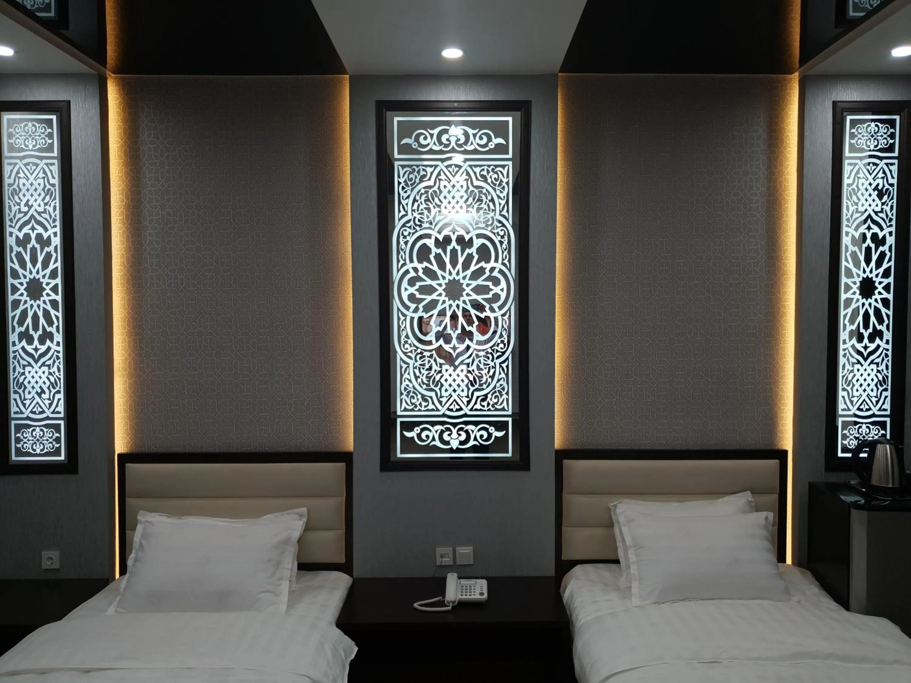 Bed in SAFIR BUSINESS HOTEL o