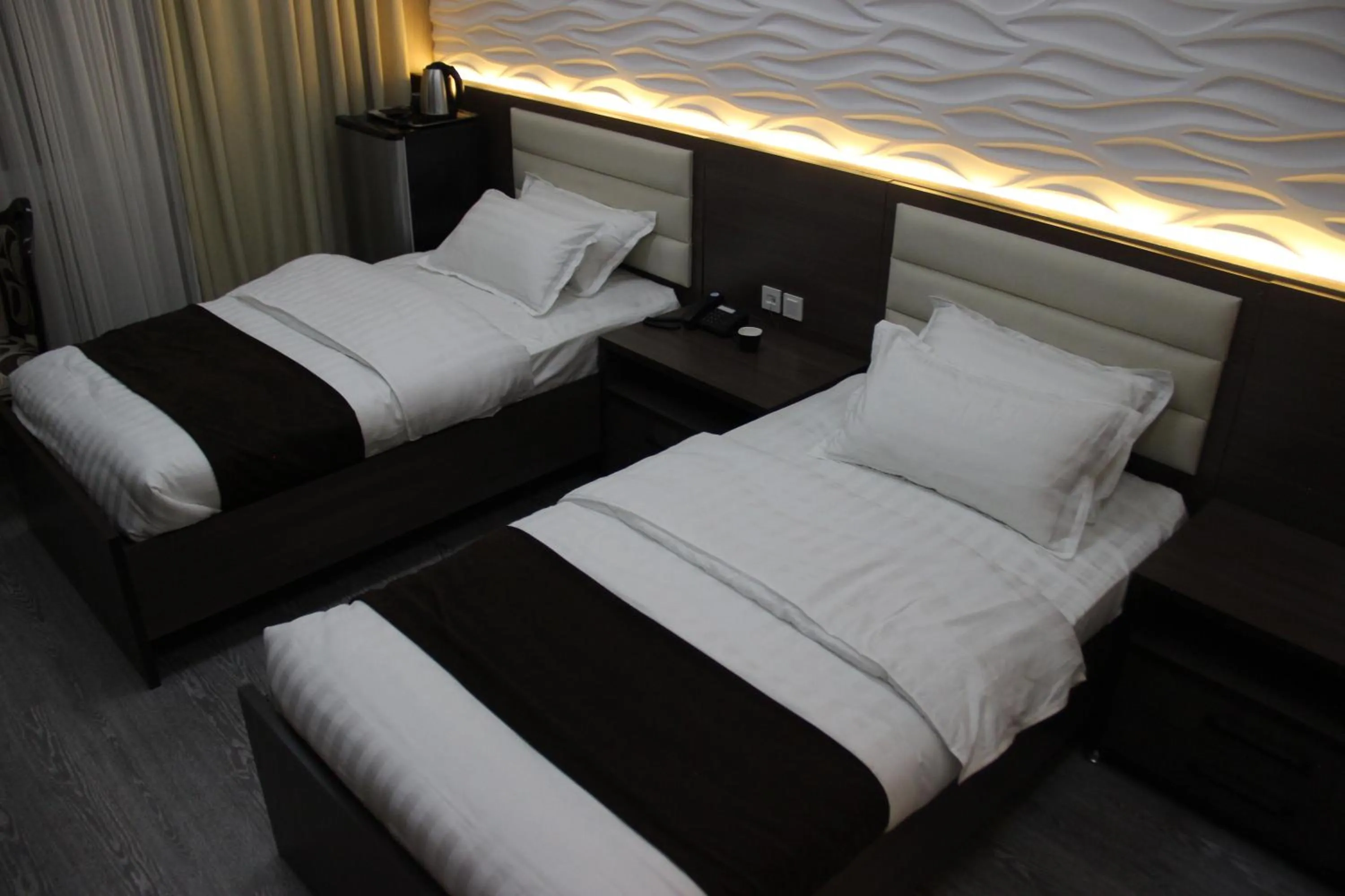 Bed in SAFIR BUSINESS HOTEL o
