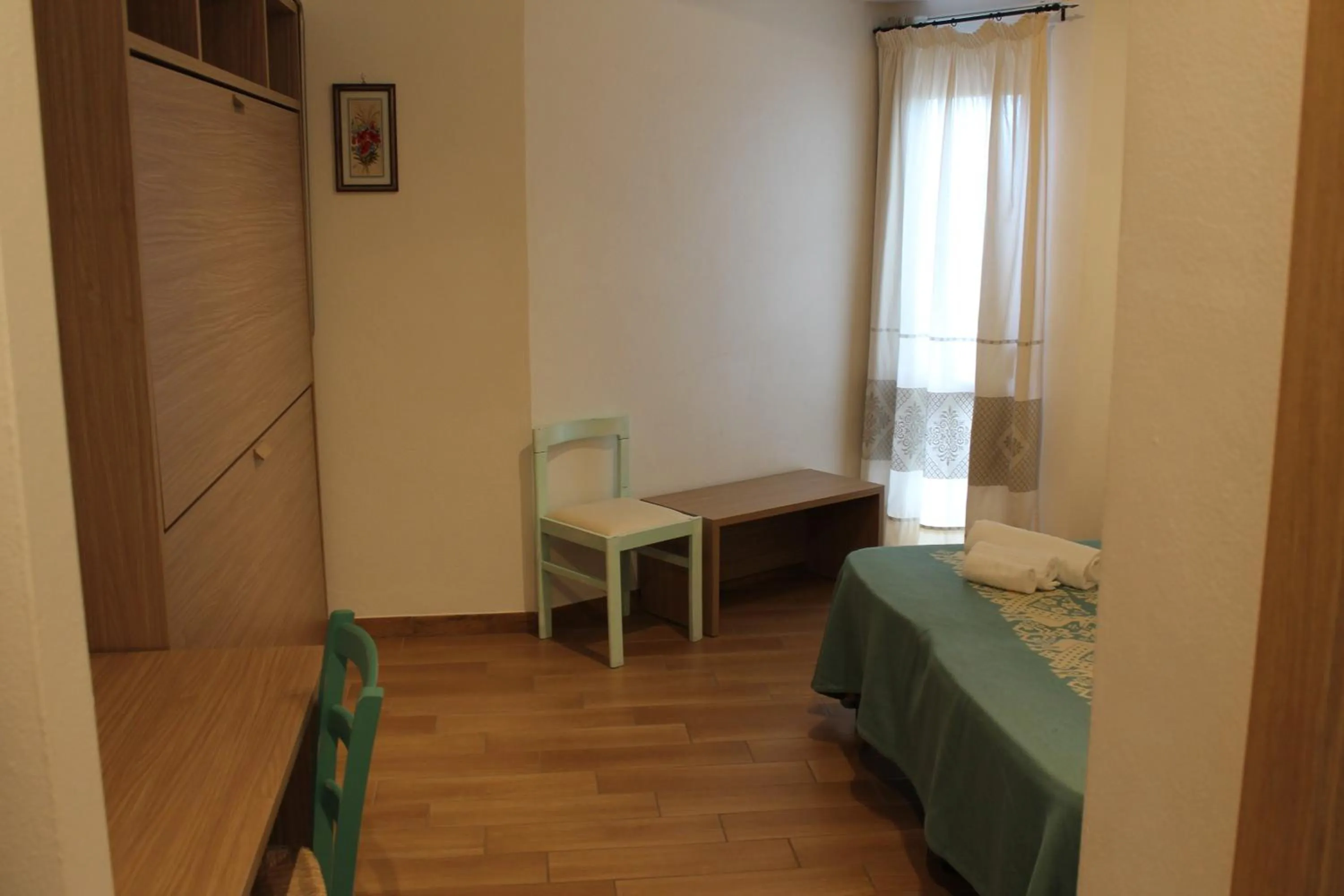 Bed in Hotel Le Mimose