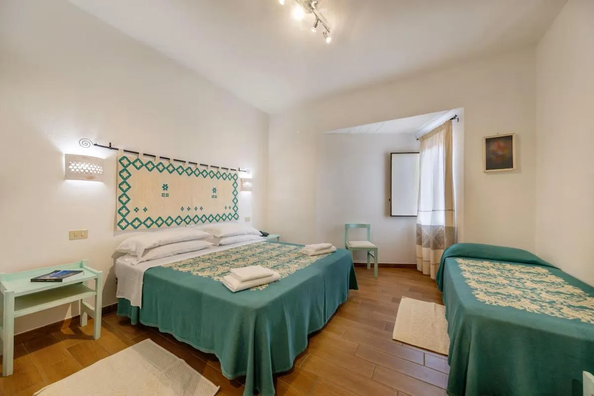 Bed in Hotel Le Mimose