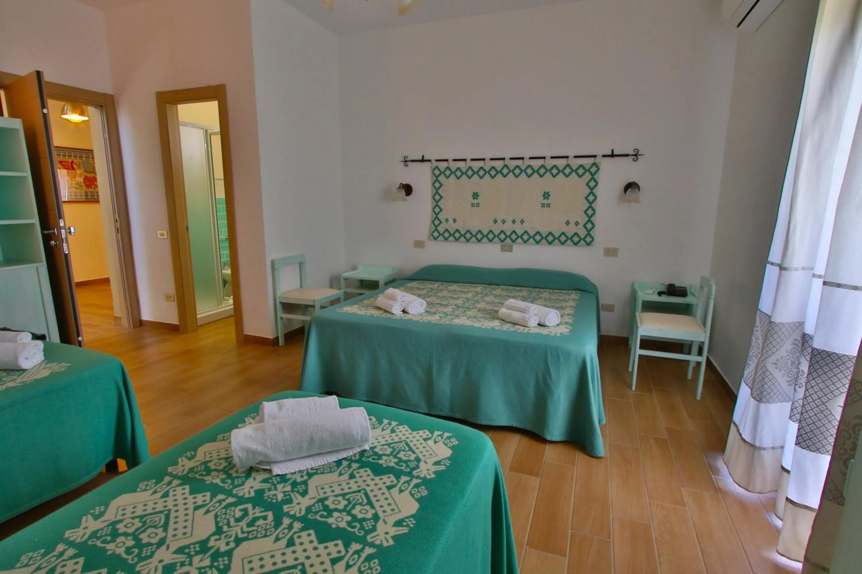 Bed in Hotel Le Mimose