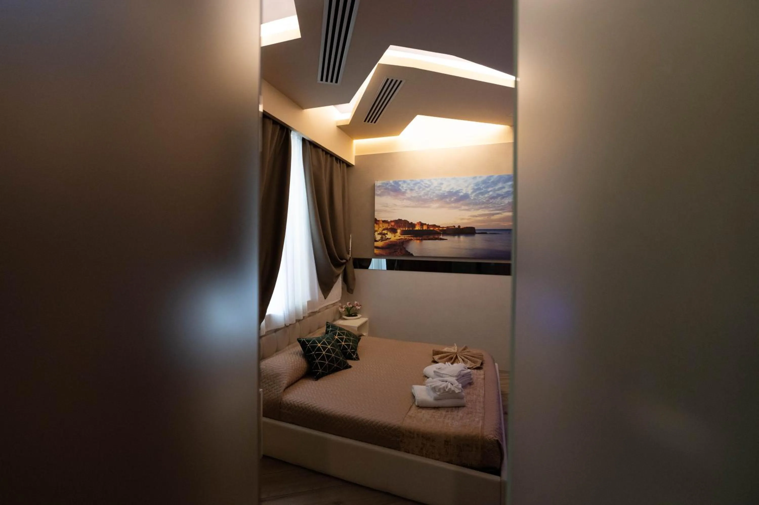 Bed in Th Luxury Rooms & Apartment