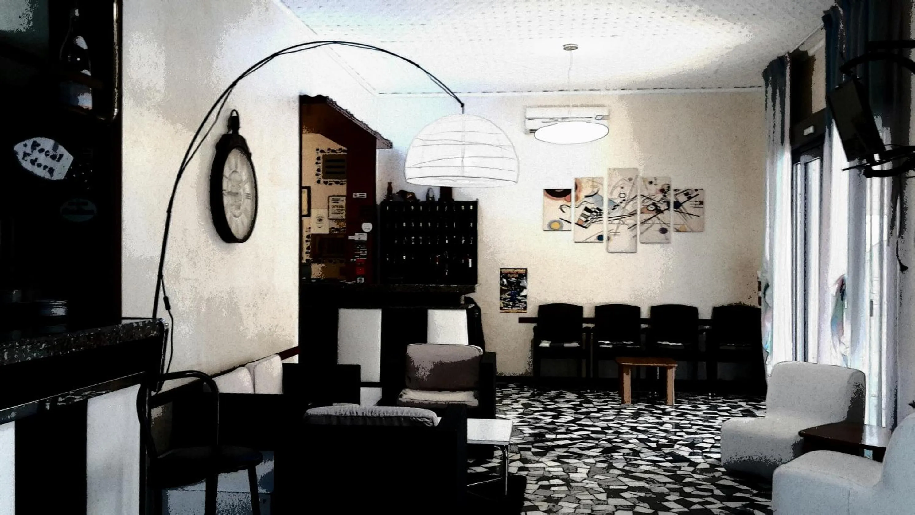 Communal lounge/ TV room in Hotel Edera