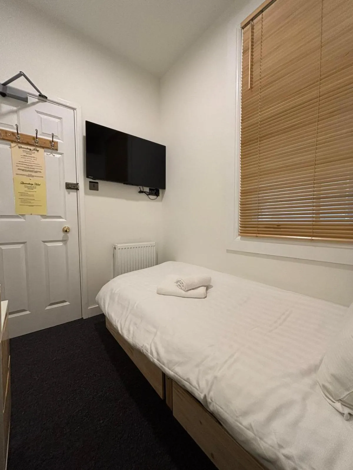 Bed in The Queensbury Hotel