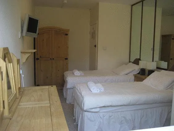 Bed in The Queensbury Hotel