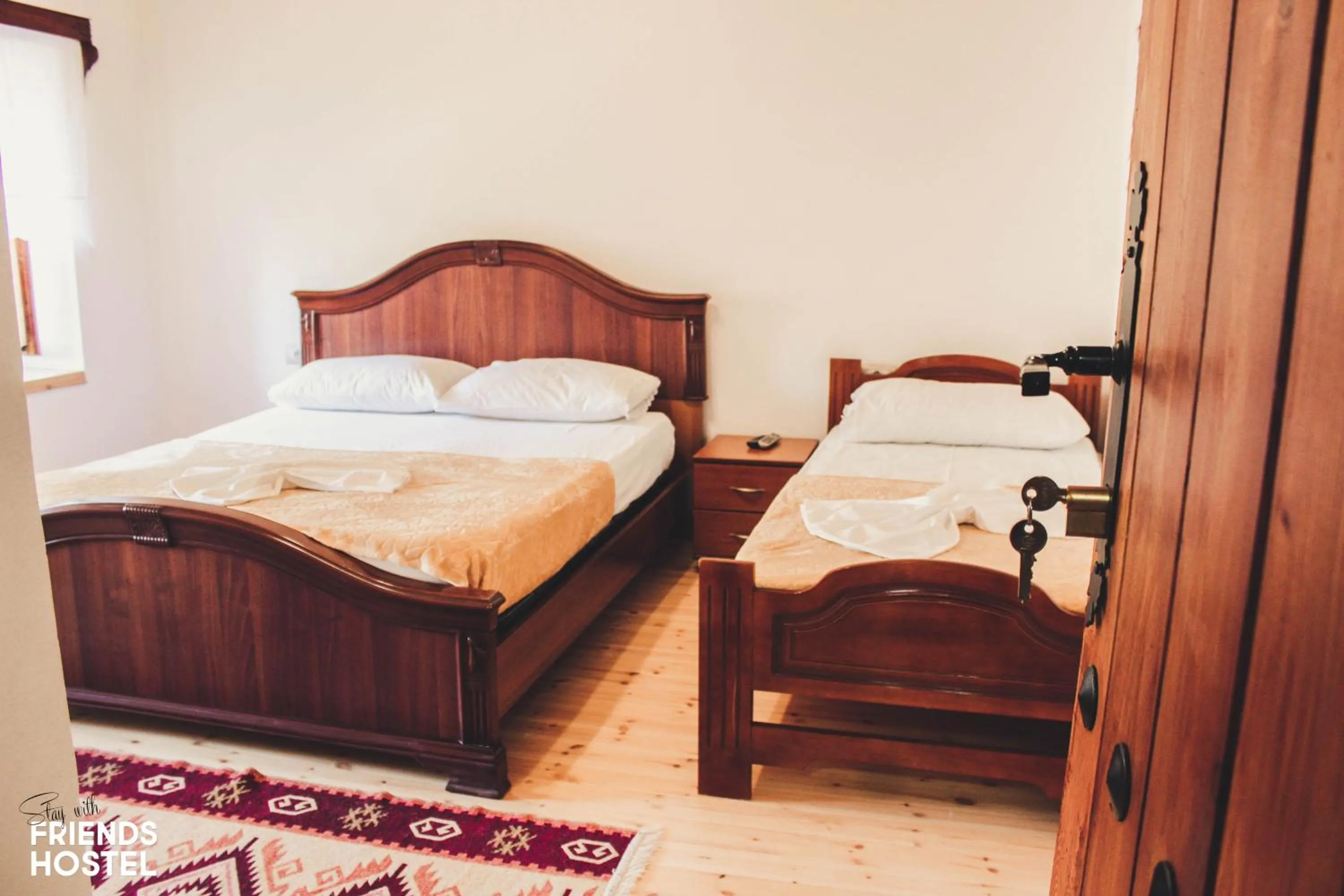 Quadruple Room with Private Bathroom in Friends' Guesthouse & Hostel