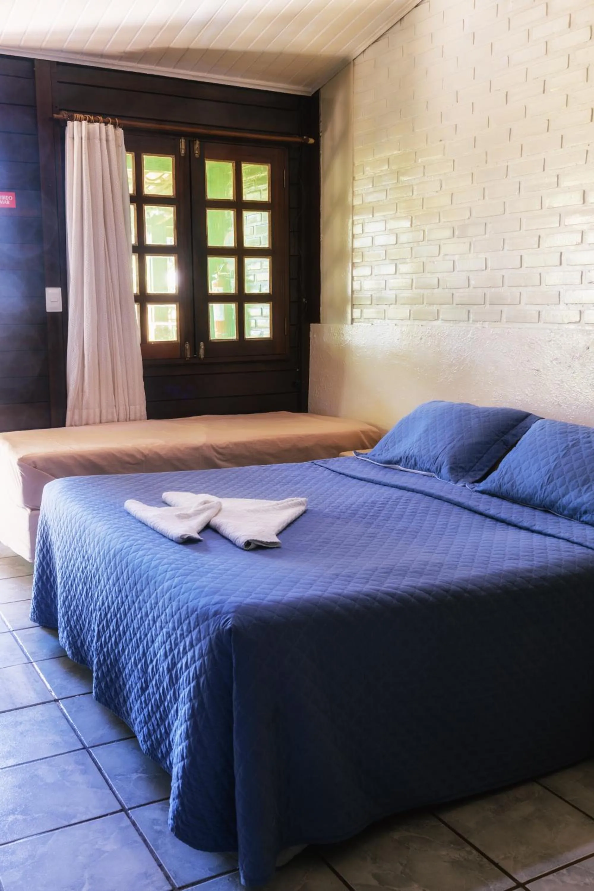 Bed in Pousada Mabuya