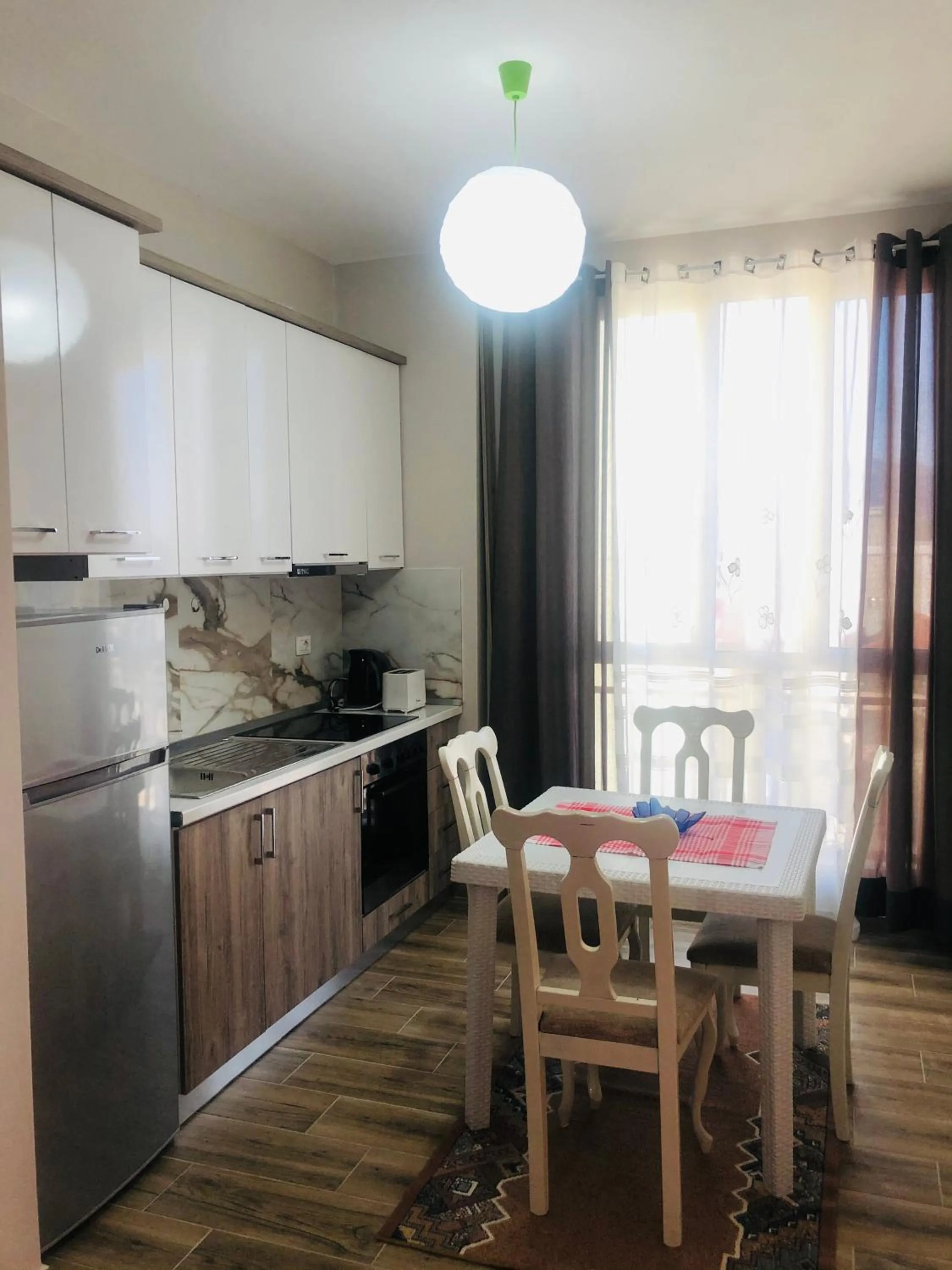 Kitchen or kitchenette in Rezidenca SHOPI Apartments