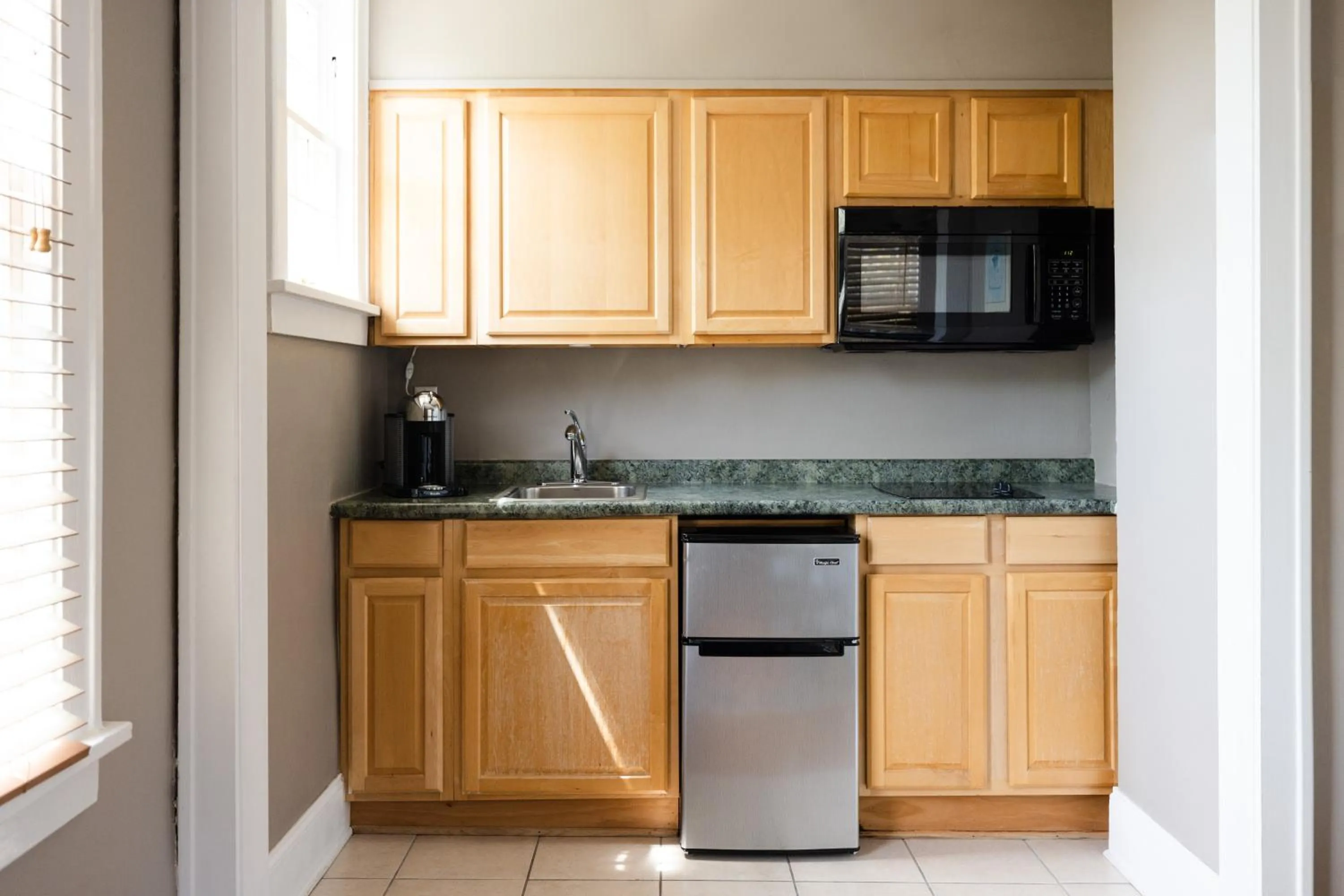 Kitchen or kitchenette in Princess Anne Boutique Hotel