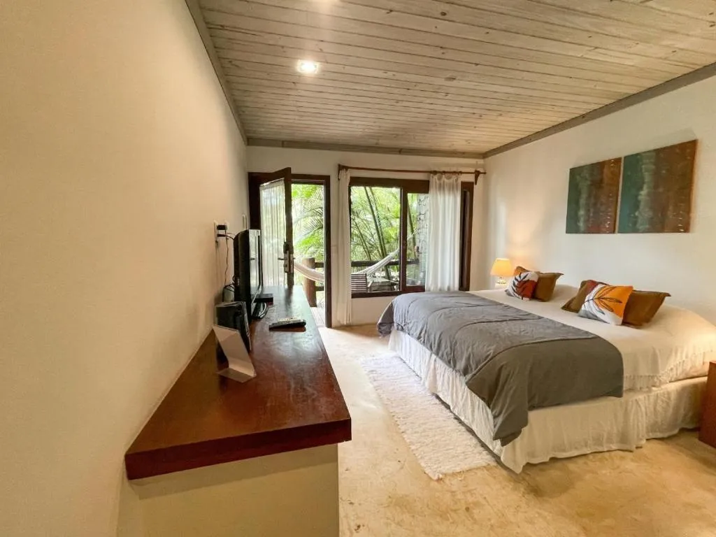 Bed in Morada da Praia do Rosa Pousada