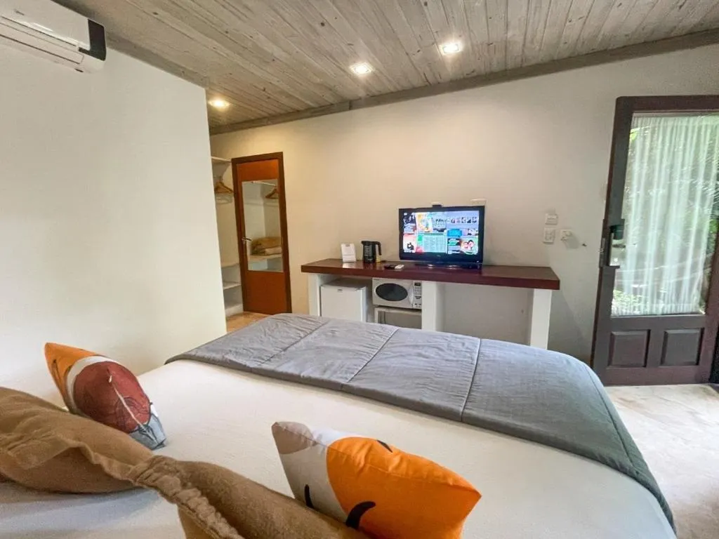 Bed in Morada da Praia do Rosa Pousada