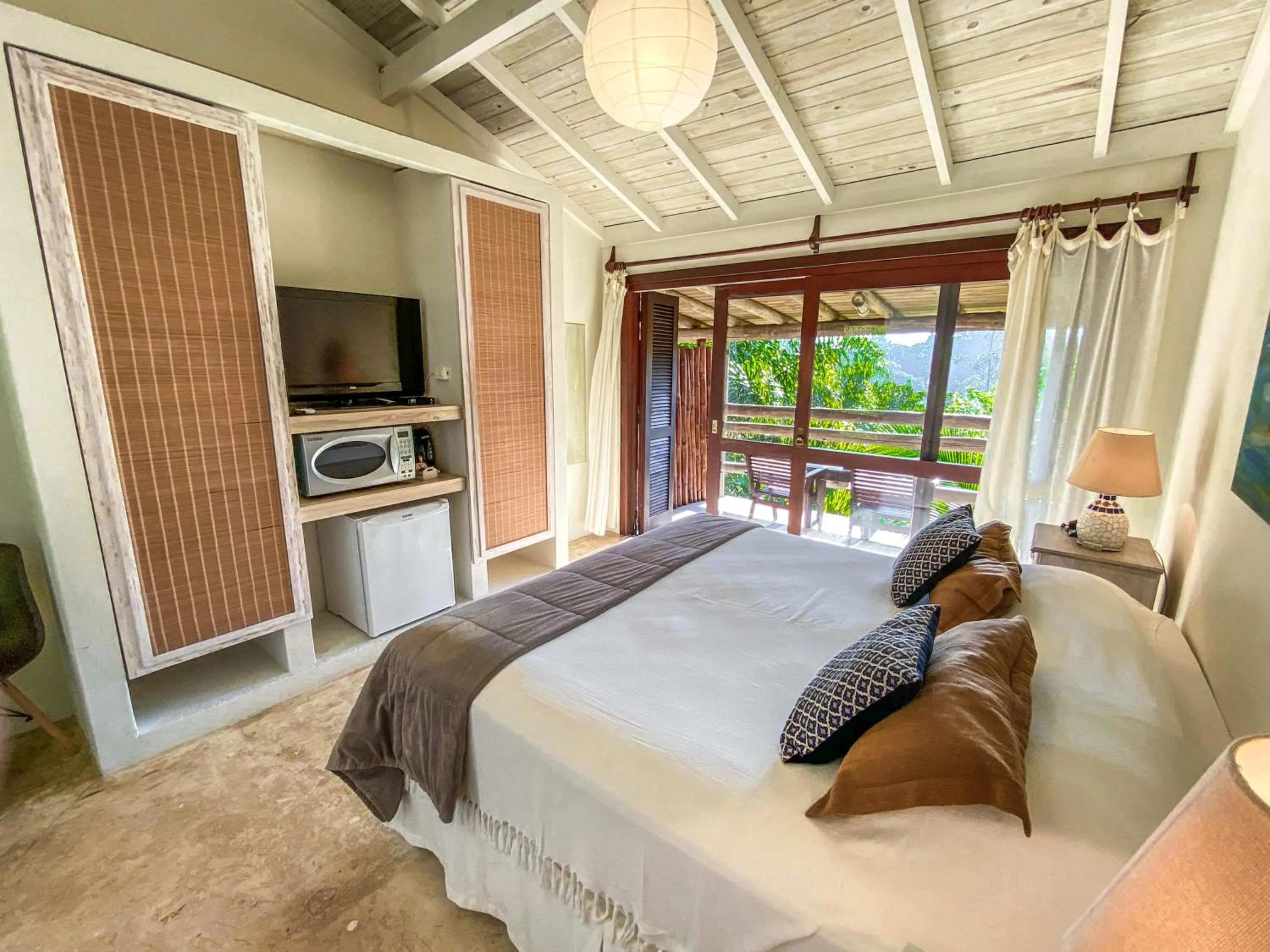 Bed in Morada da Praia do Rosa Pousada