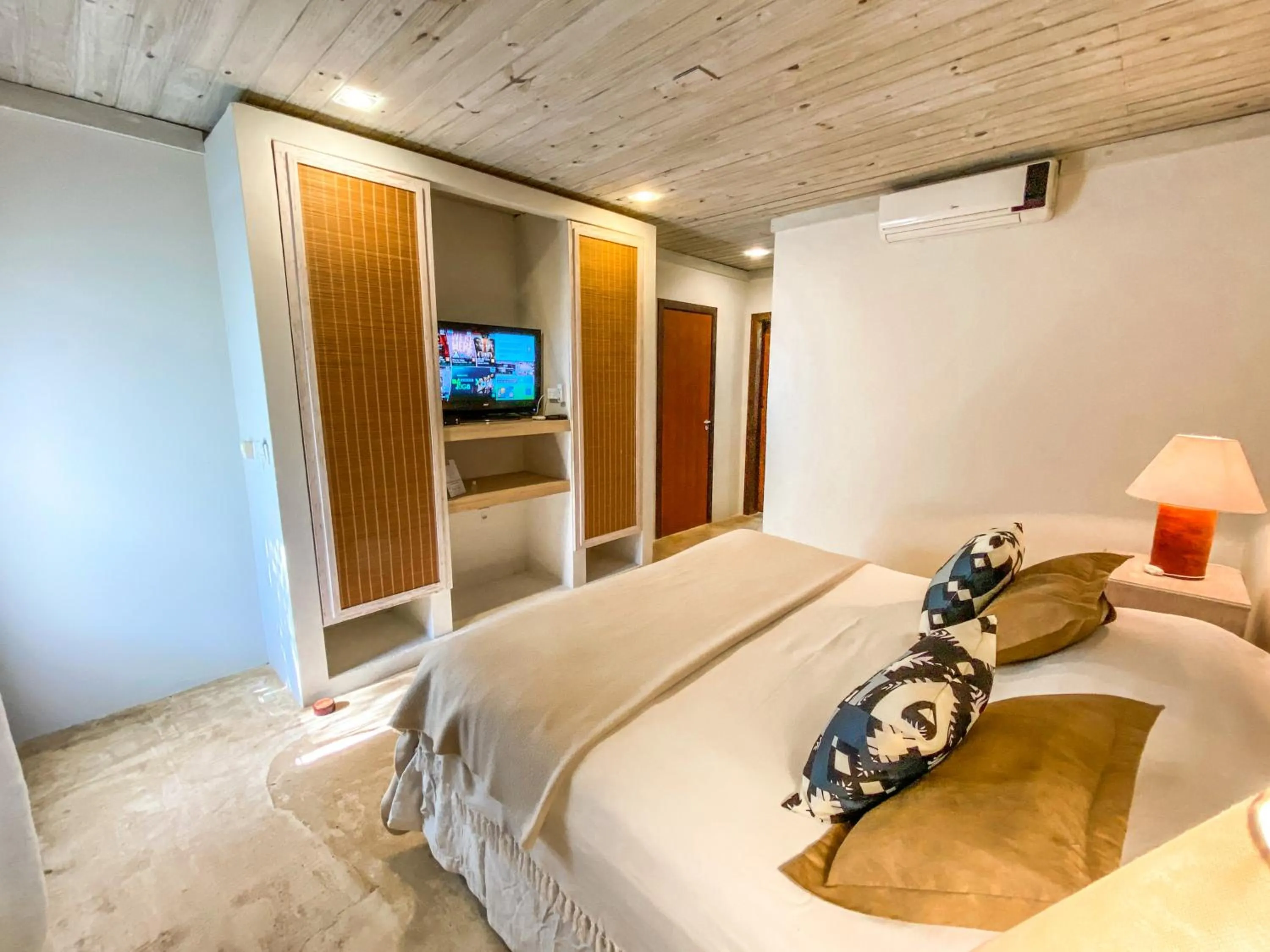 Bed in Morada da Praia do Rosa Pousada