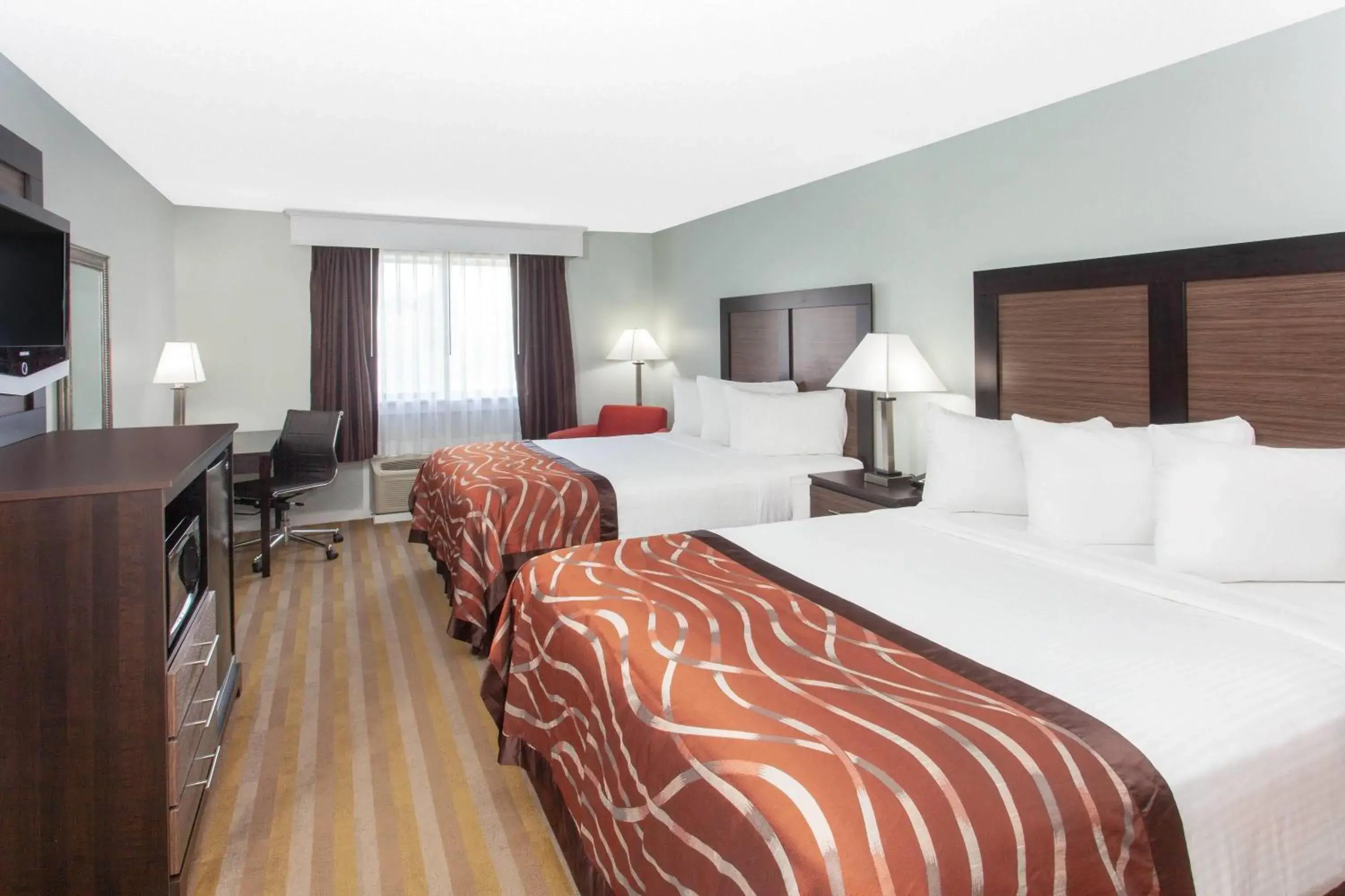 Photo of the whole room, Bed in Baymont by Wyndham Grand Haven Photo of the whole room, Bed in Baymont by Wyndham Grand Haven