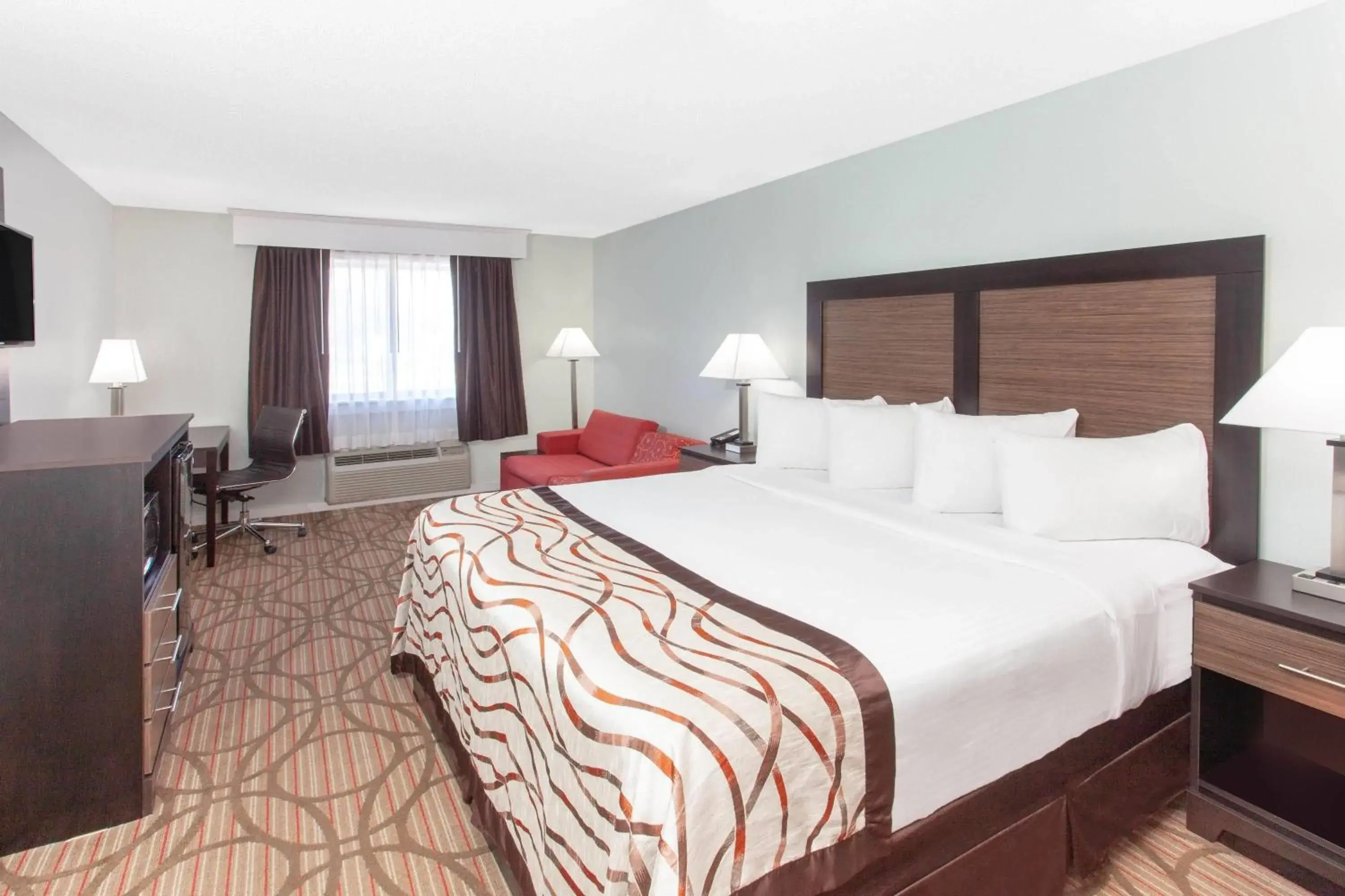 Photo of the whole room, Bed in Baymont by Wyndham Grand Haven Photo of the whole room, Bed in Baymont by Wyndham Grand Haven