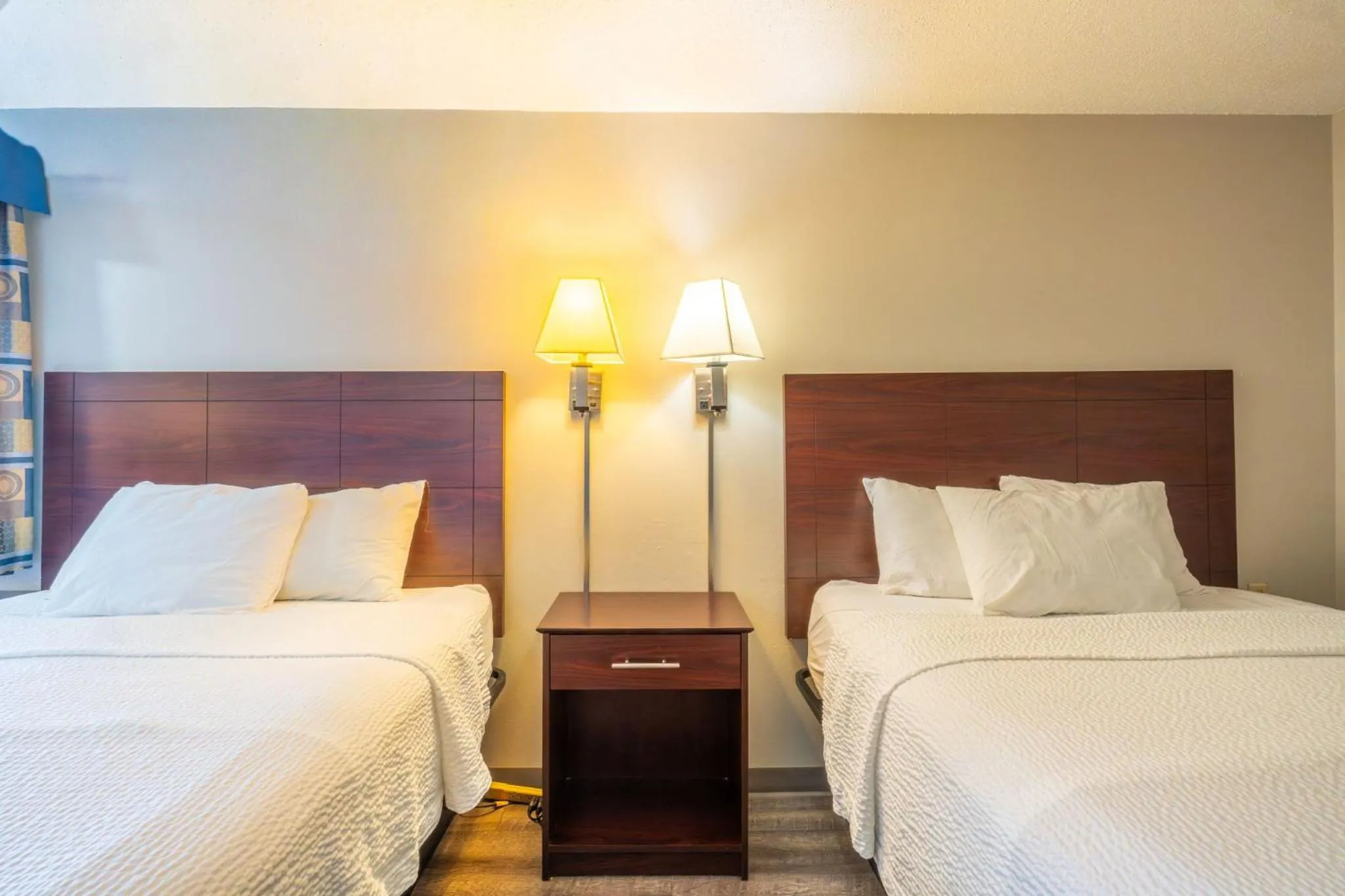 Bed in Days Inn by Wyndham Sioux City
